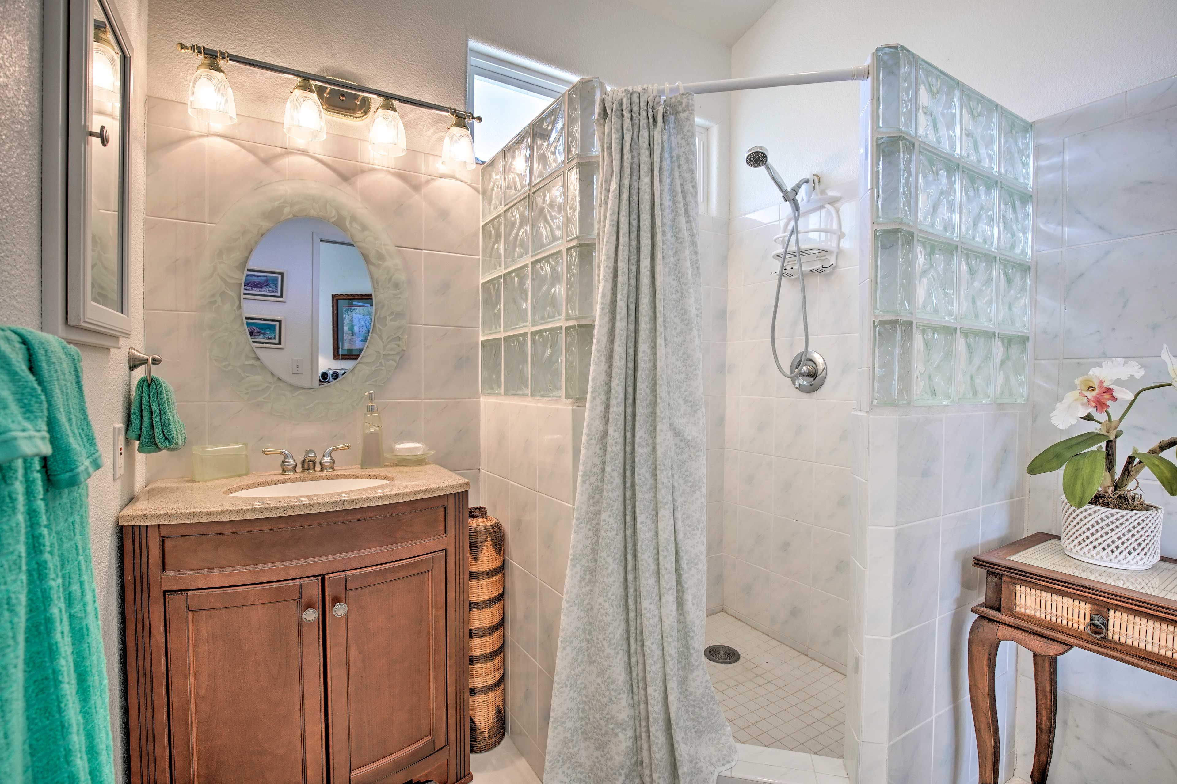 This bathroom also hosts an accessible walk-in shower.