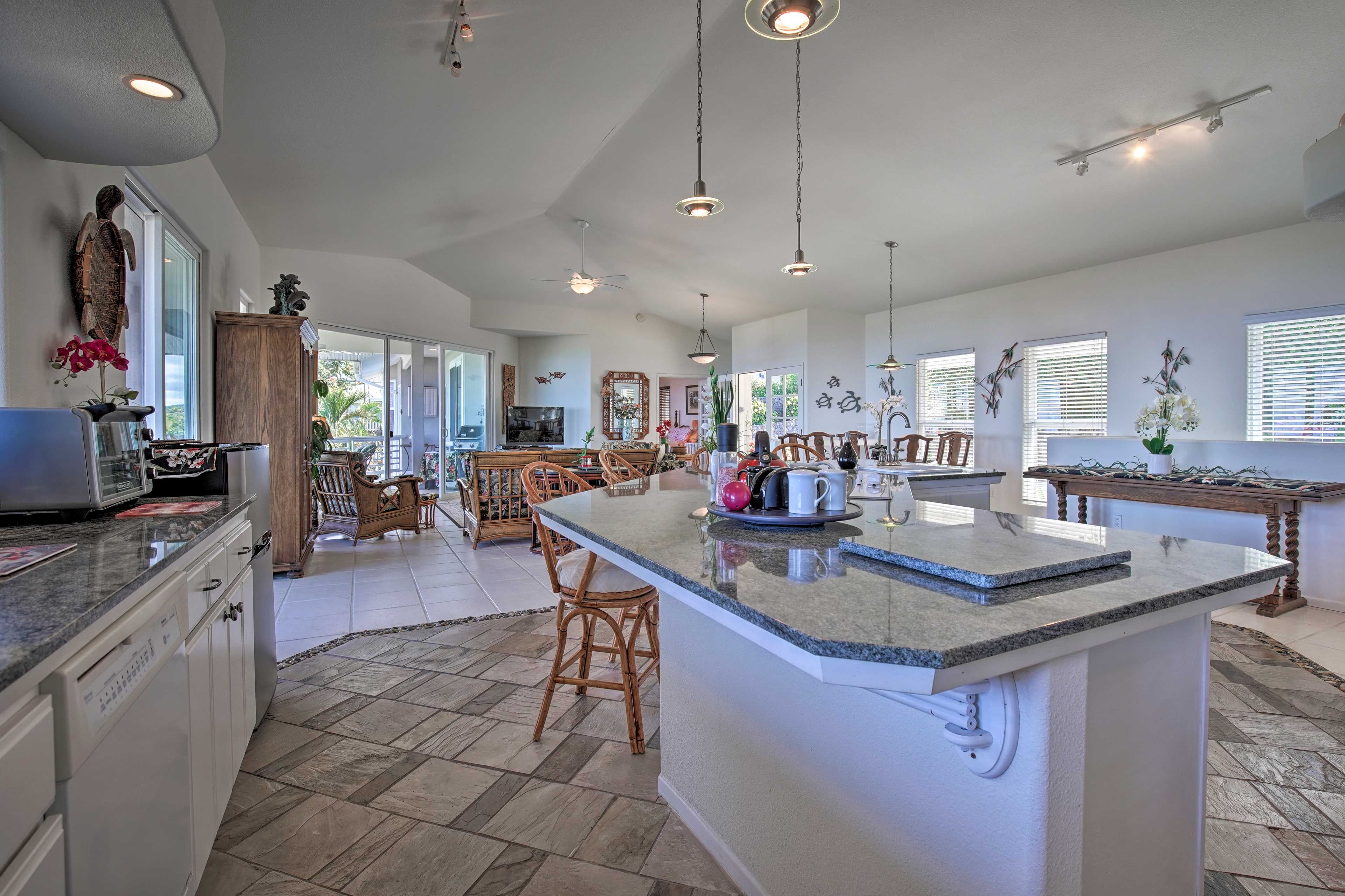 The chef can keep an eye on the whole group with this open-concept living space.