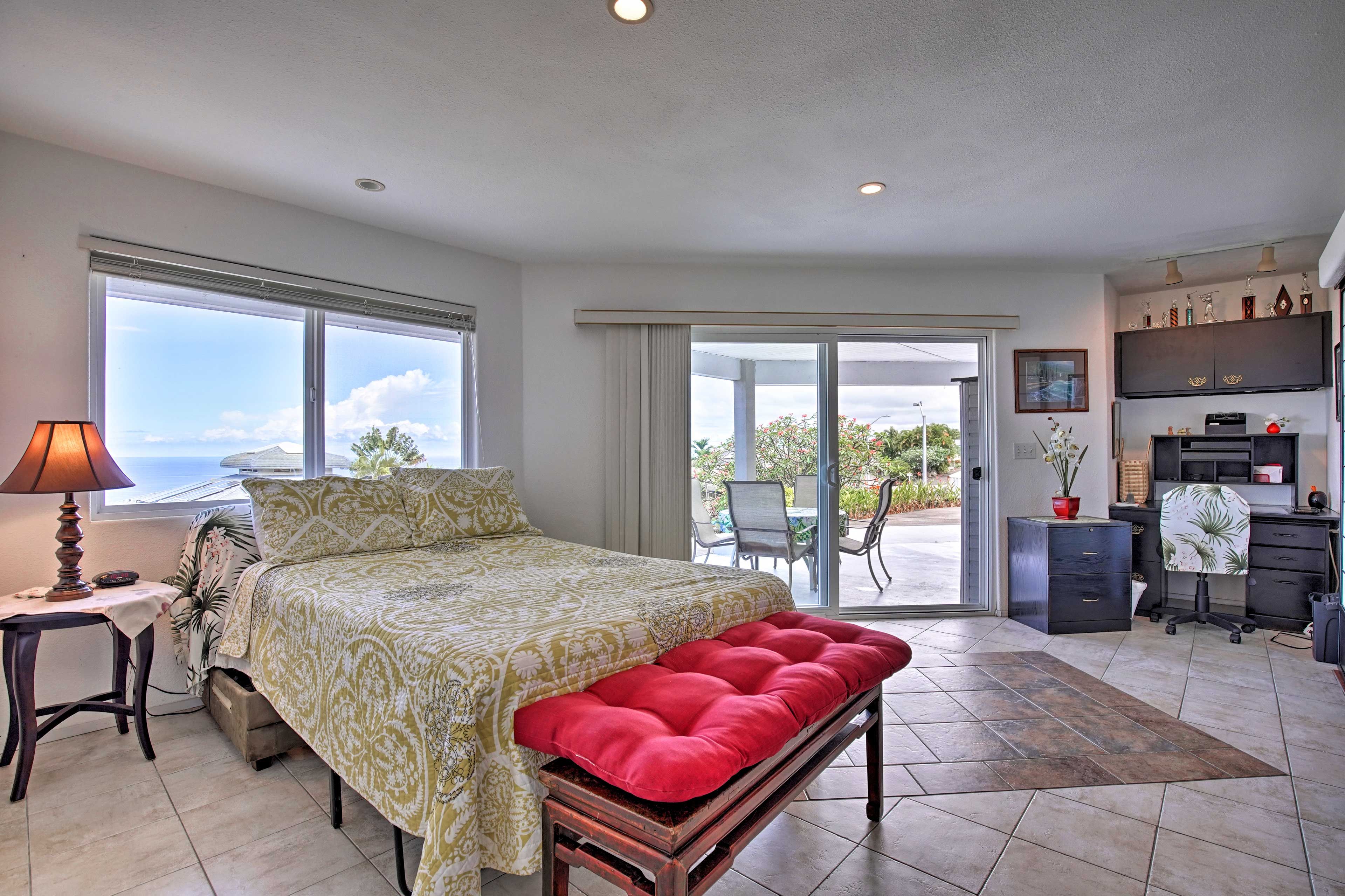 The 'man cave' offers direct access to the spacious lower lanai.