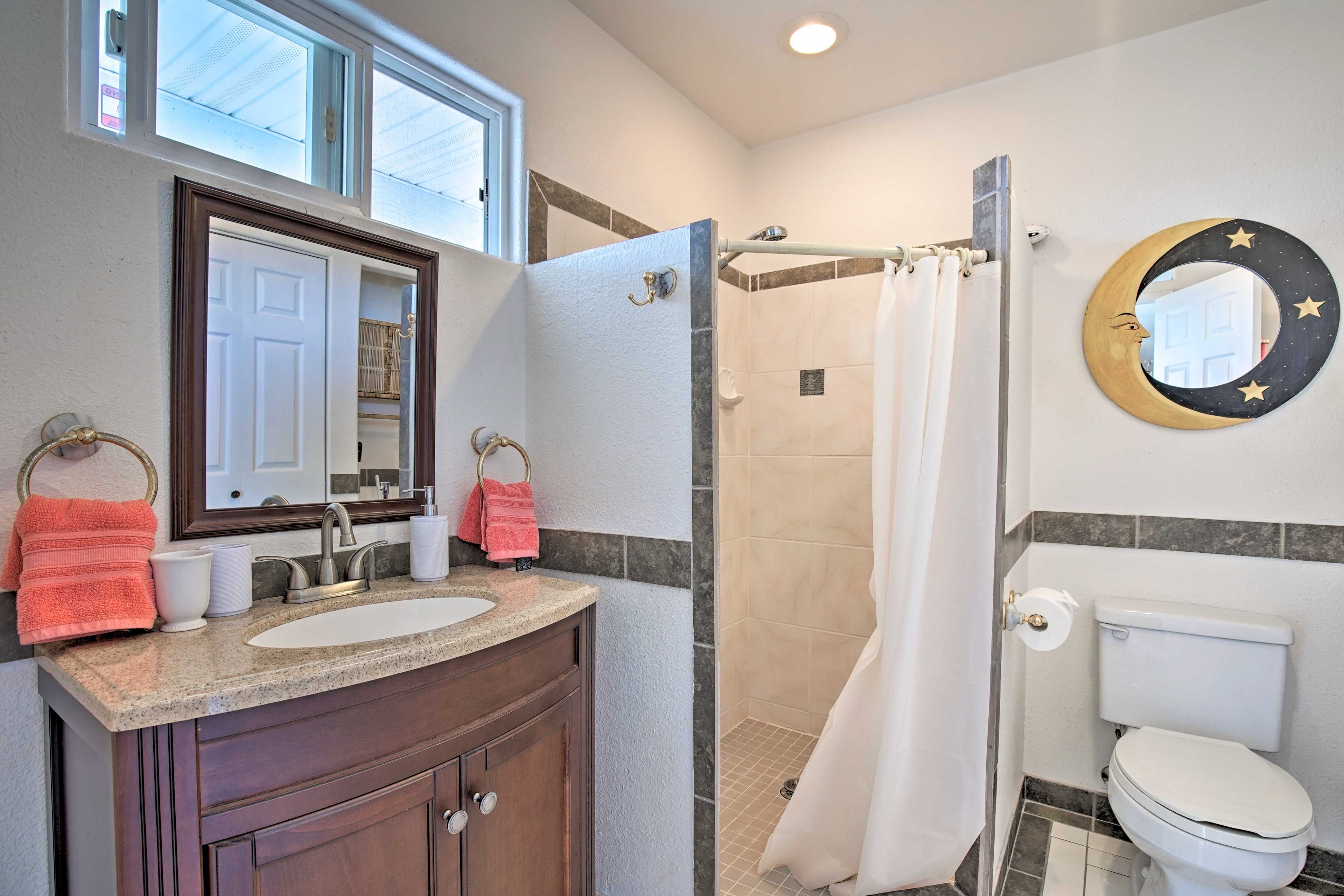 The 3rd bathroom (located downstairs) also houses an accessible walk-in shower.