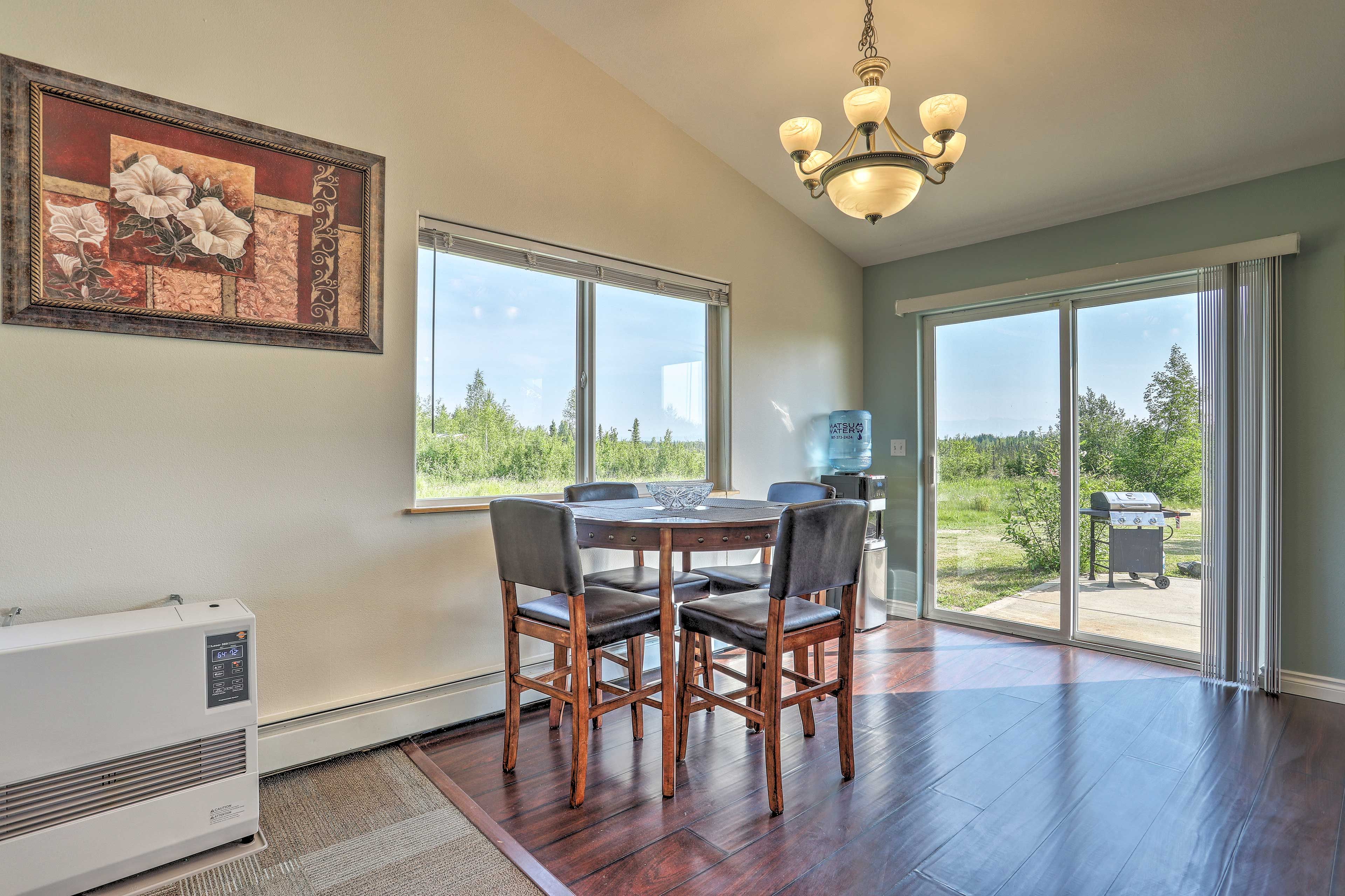 The wooden dining table seats 4.