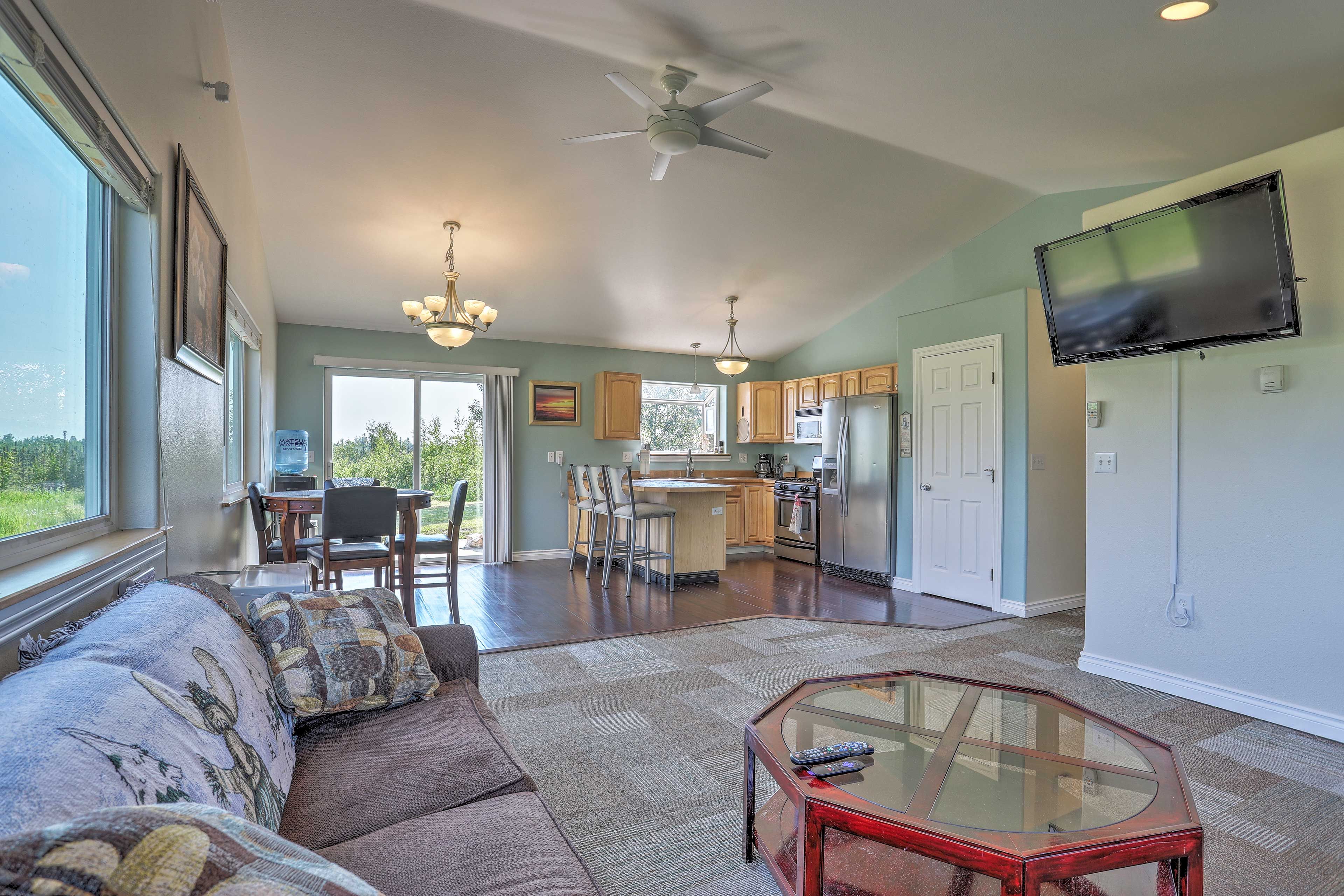 Picture windows open to mountain views.