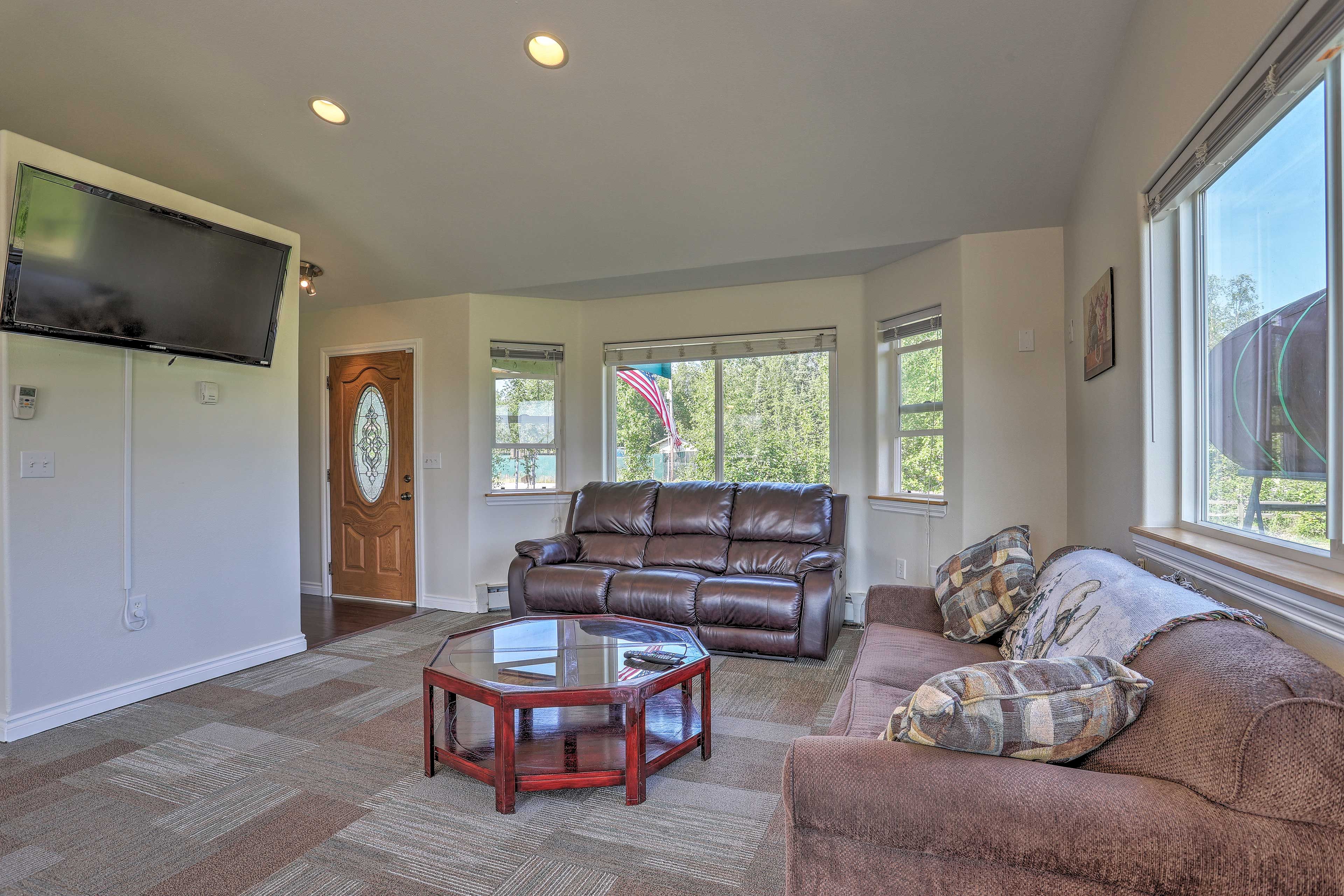 The leather sofa pulls out to provide additional sleeping for 2 guests.