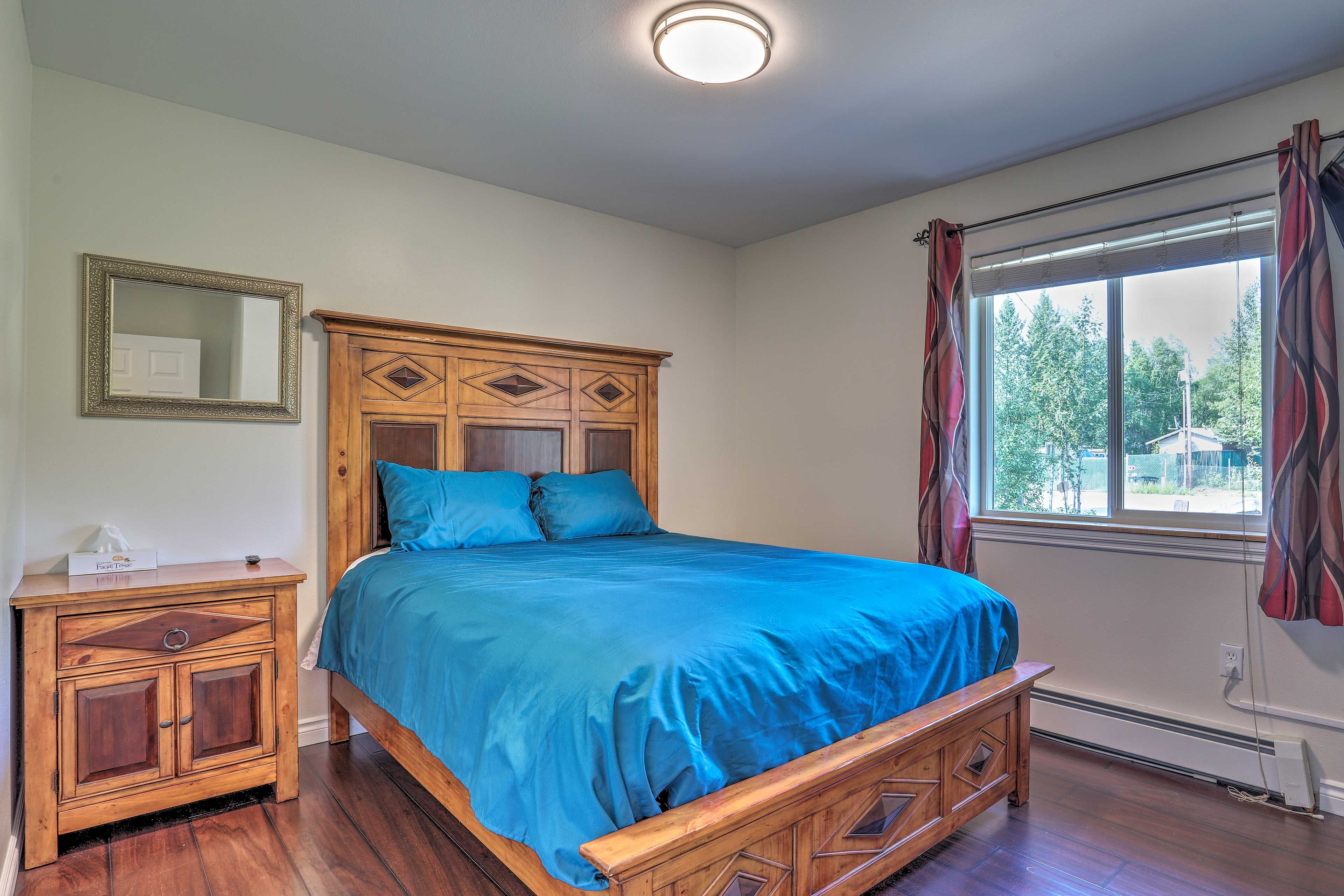 The second bedroom features a queen bed.