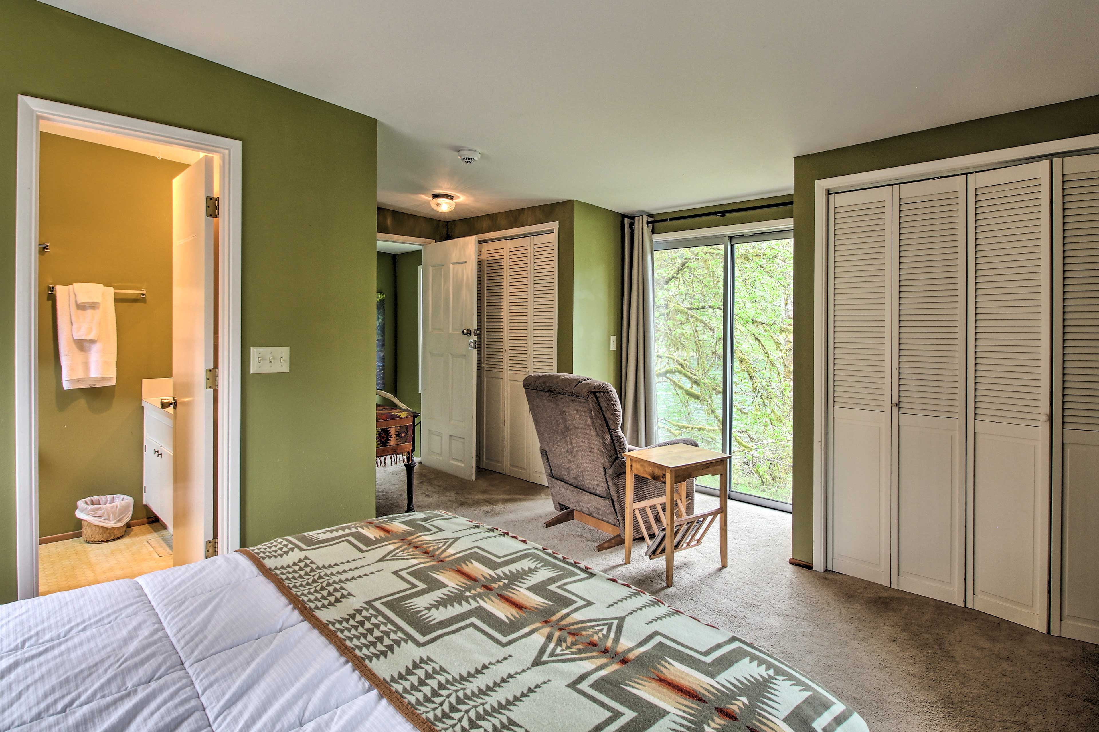 Lay back on the recliner in front of the window with river views.