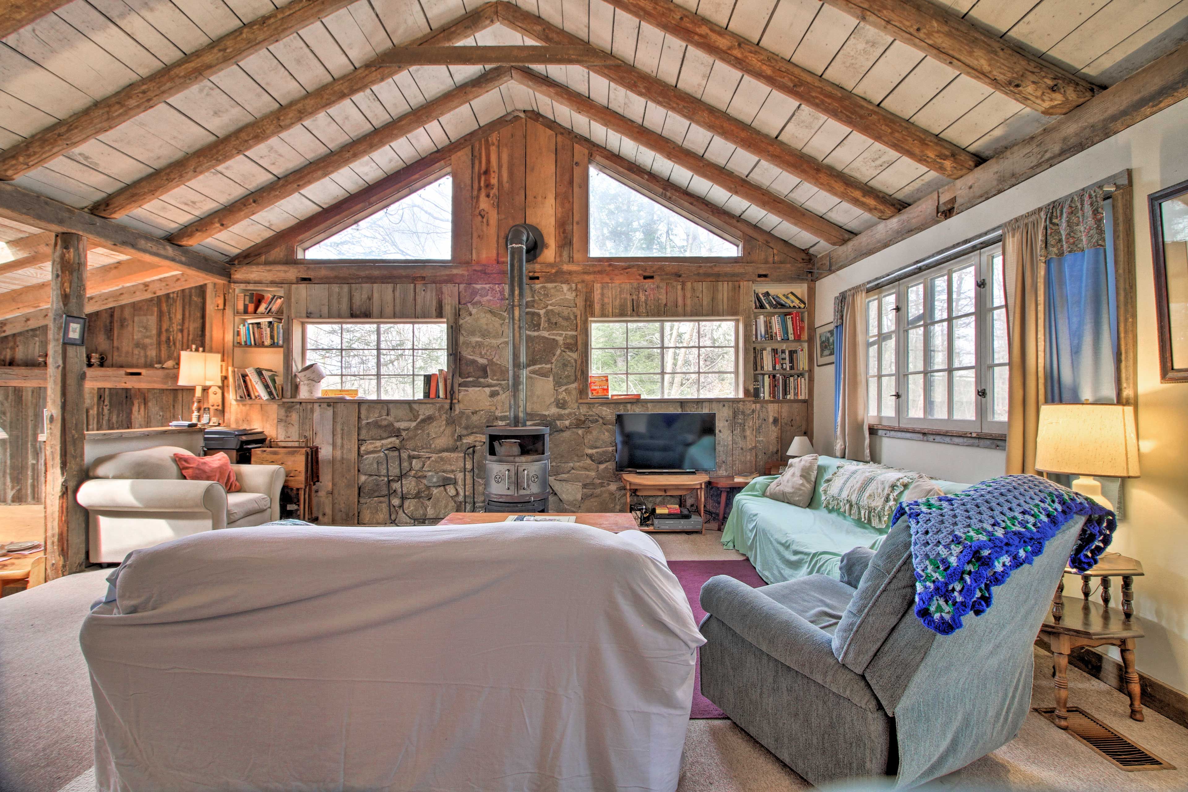 Snuggle up around the wood-burning fireplace while watching satellite TV.