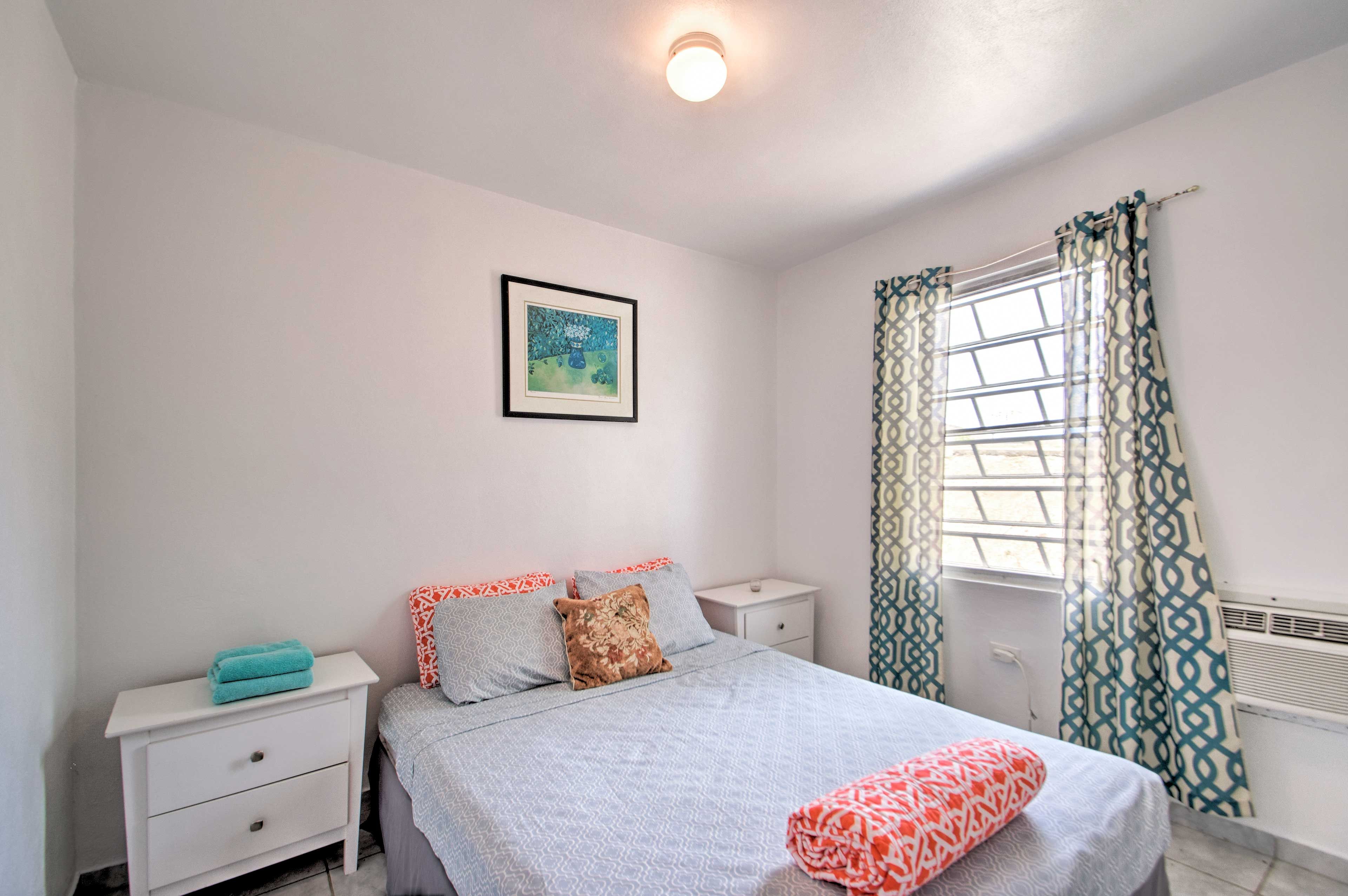 This bedroom also hosts a full-sized bed.