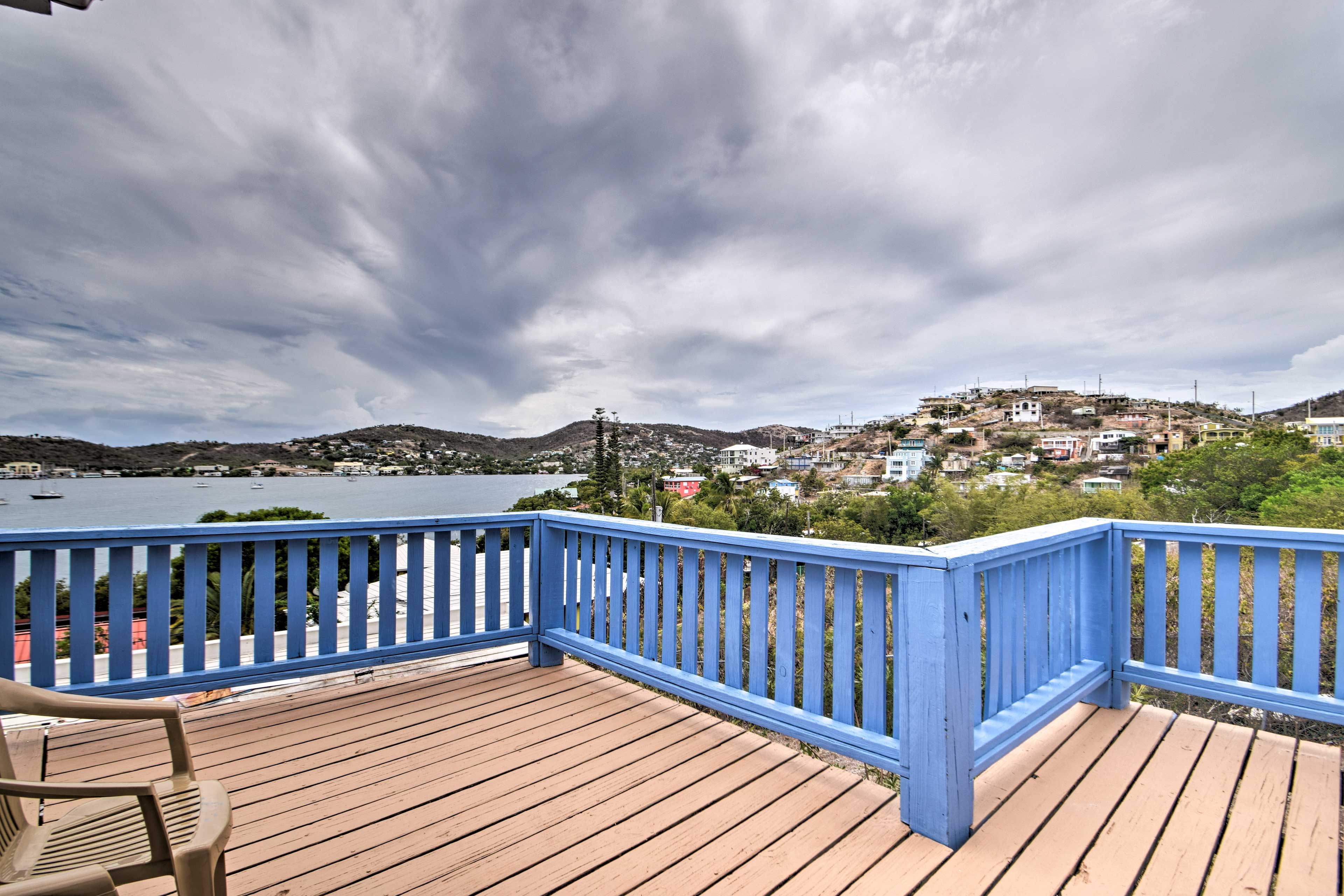 Relax with panoramic vistas on the private deck.