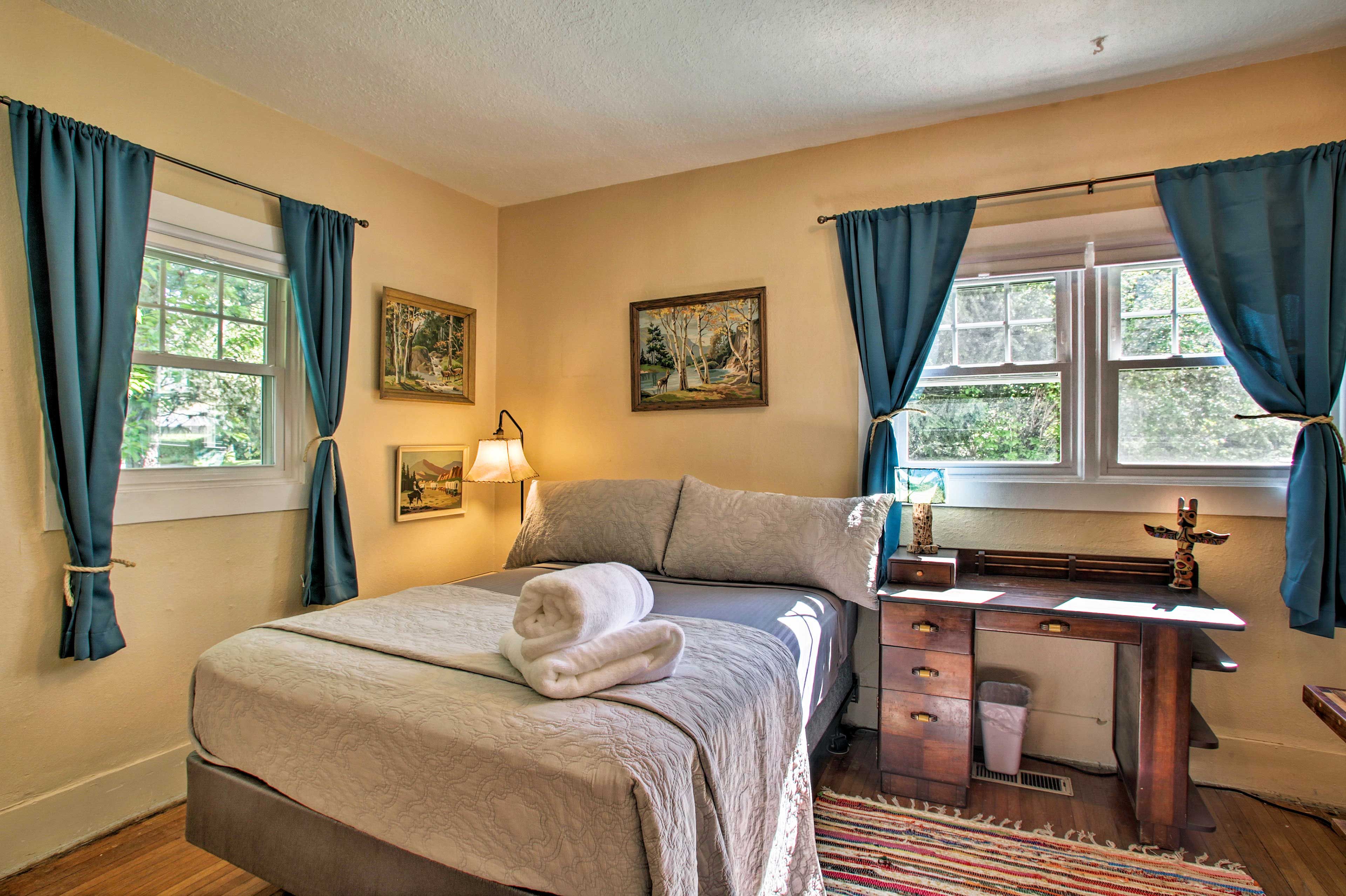 Retire to the bedroom where a queen-sized bed awaits!