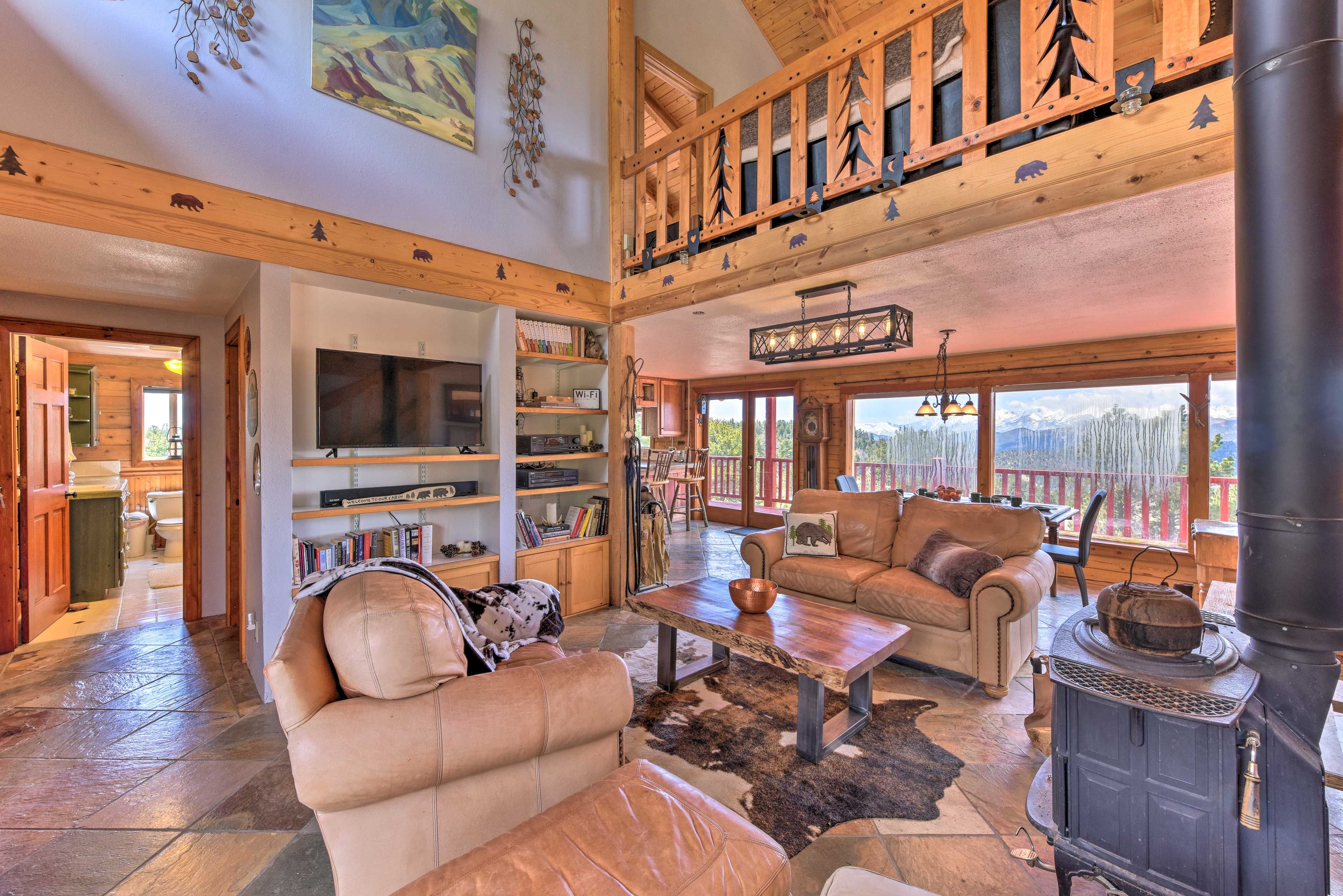 Cozy up to the fireplace as you look out at the Sange De Cristo mountain range.