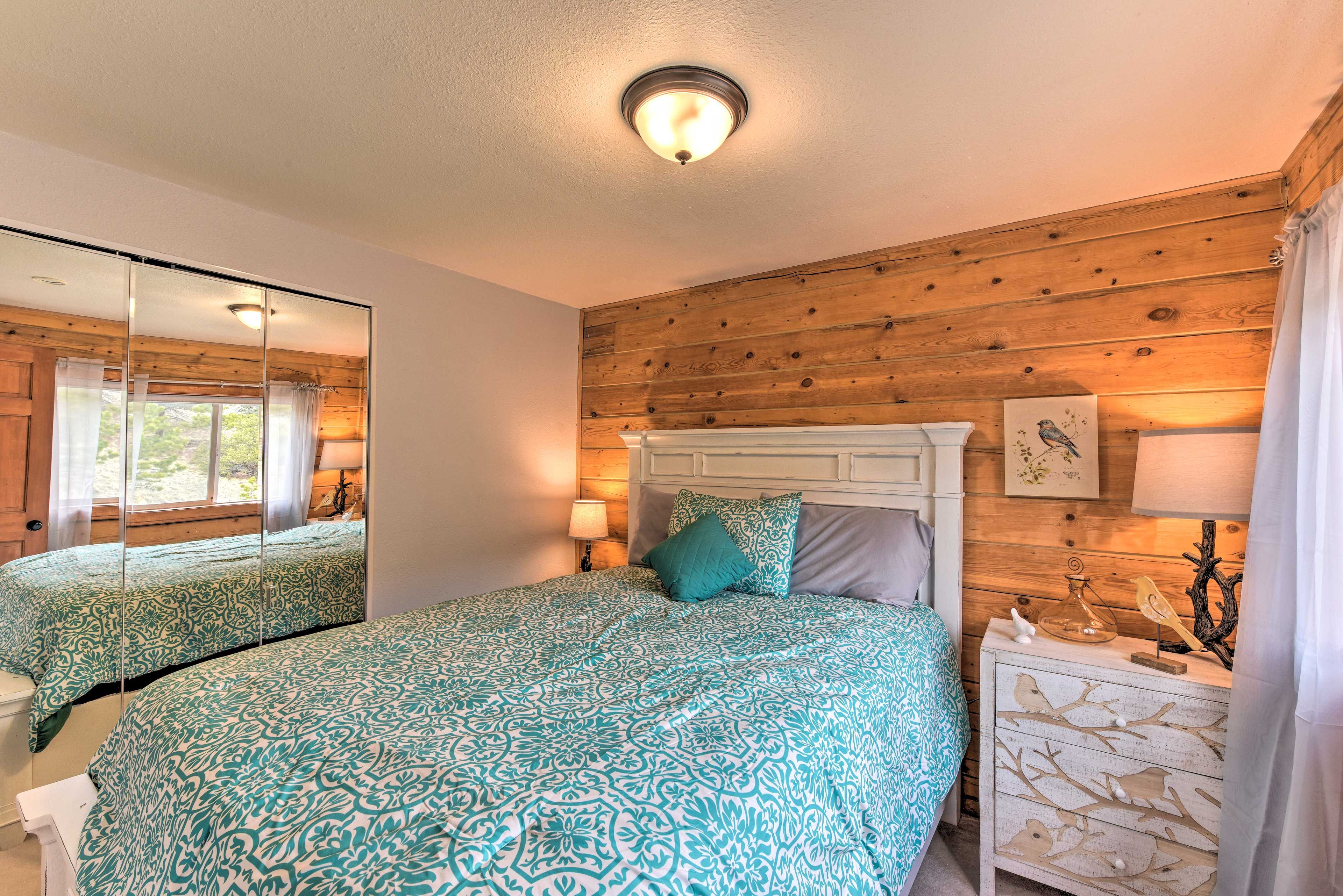The second bedroom also features a queen bed.