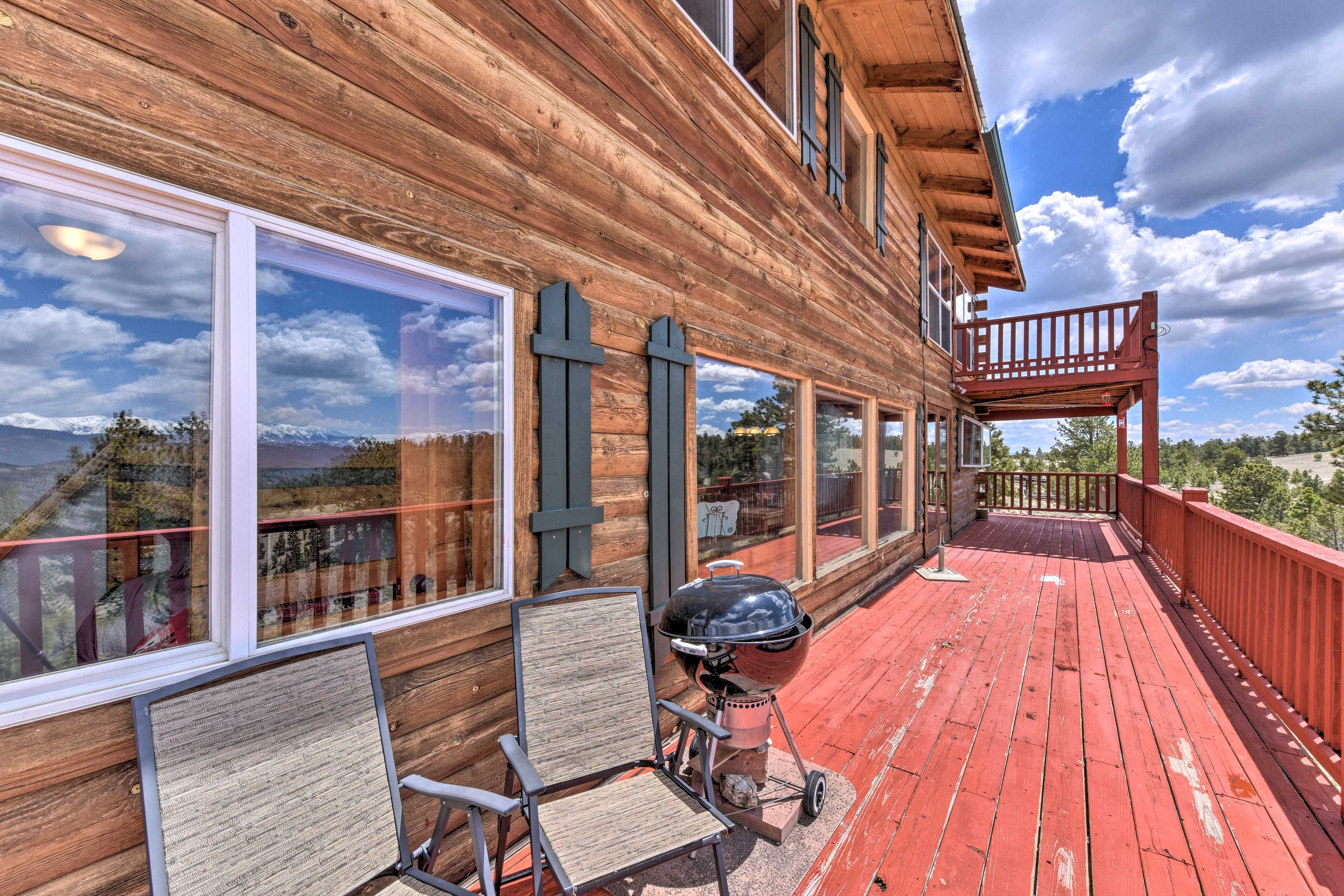 Relax on the deck as you fire up steaks on the charcoal grill.