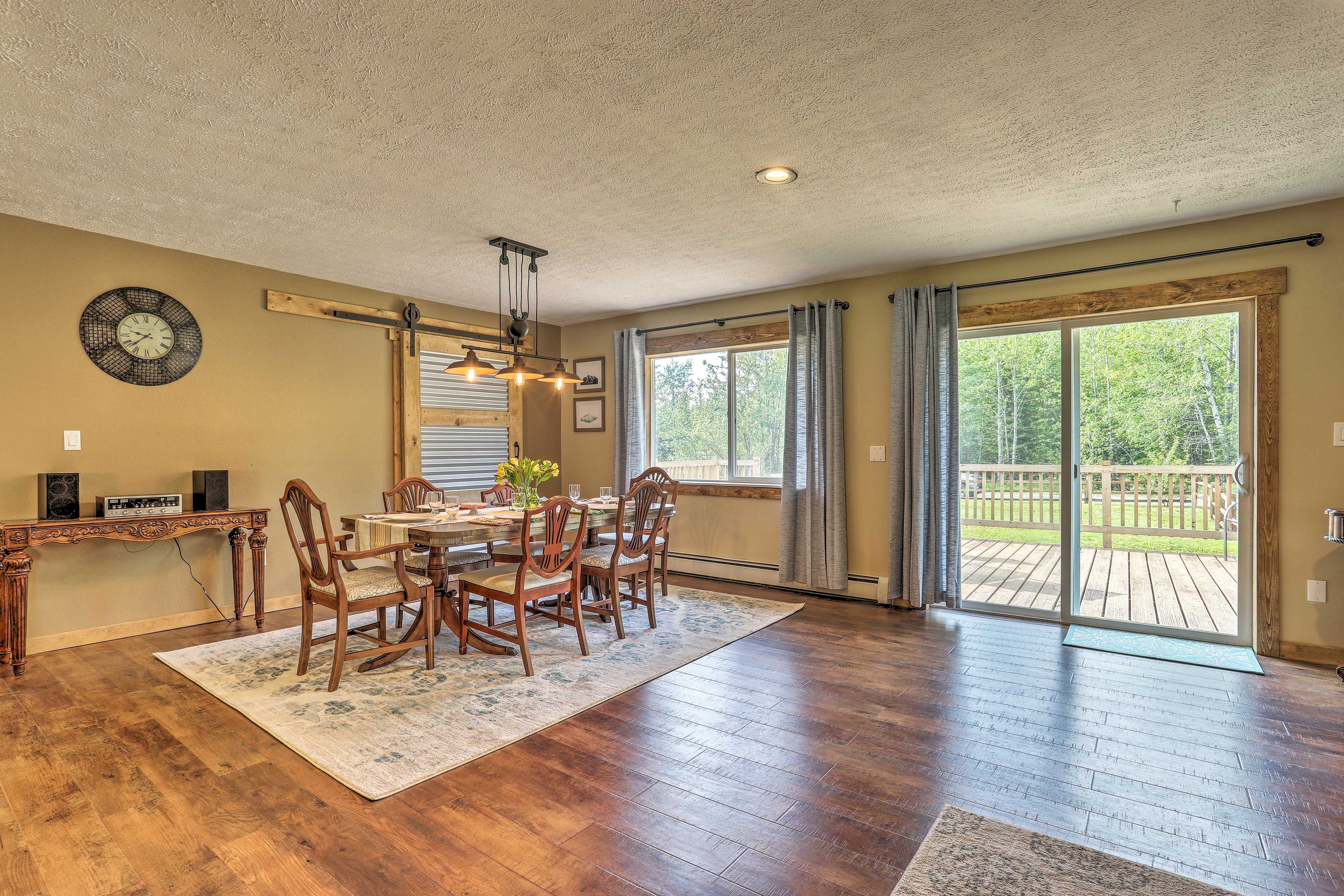 The deck is accessible just through the sliding glass doors.