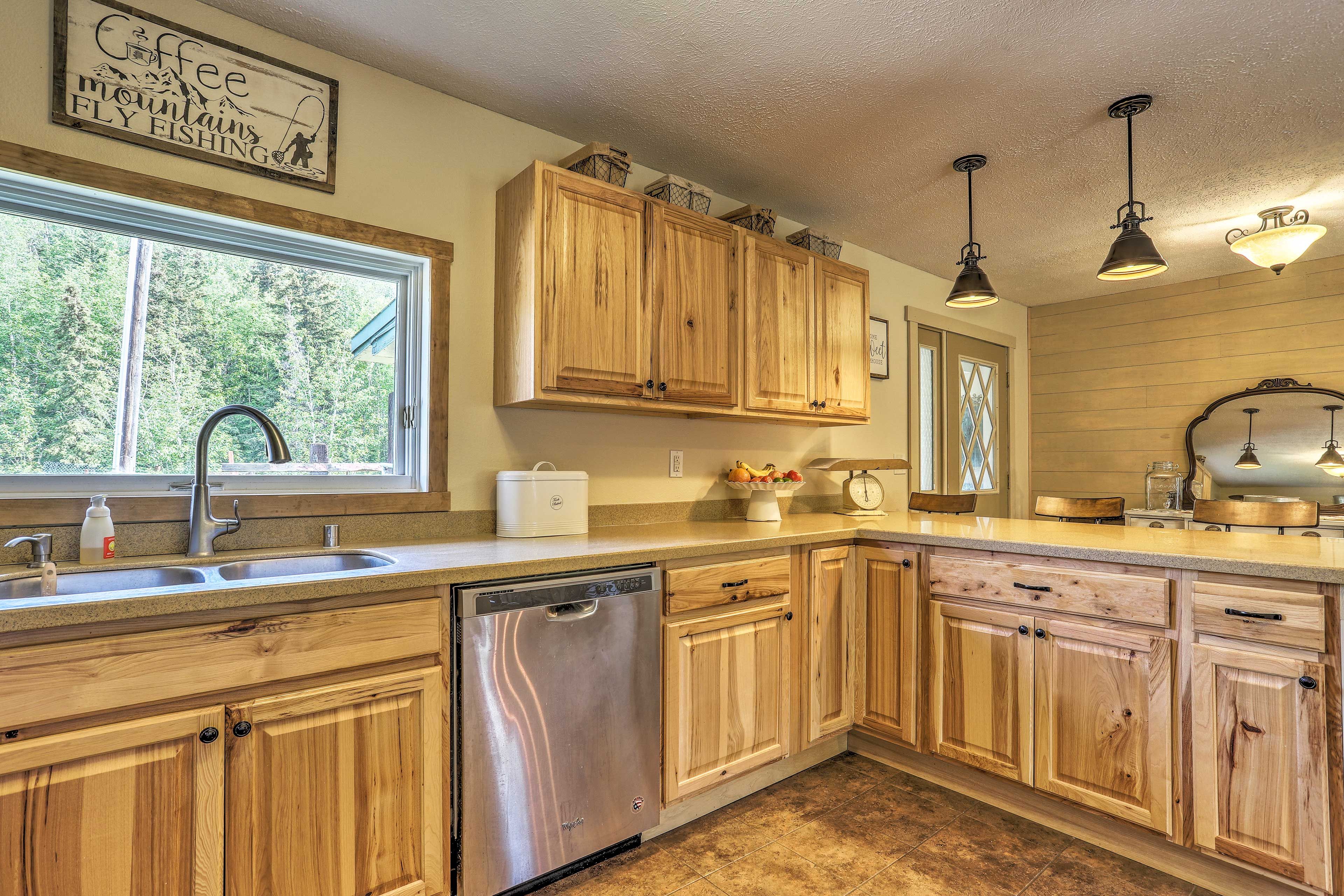 There's ample storage space in the wooden cabinets.