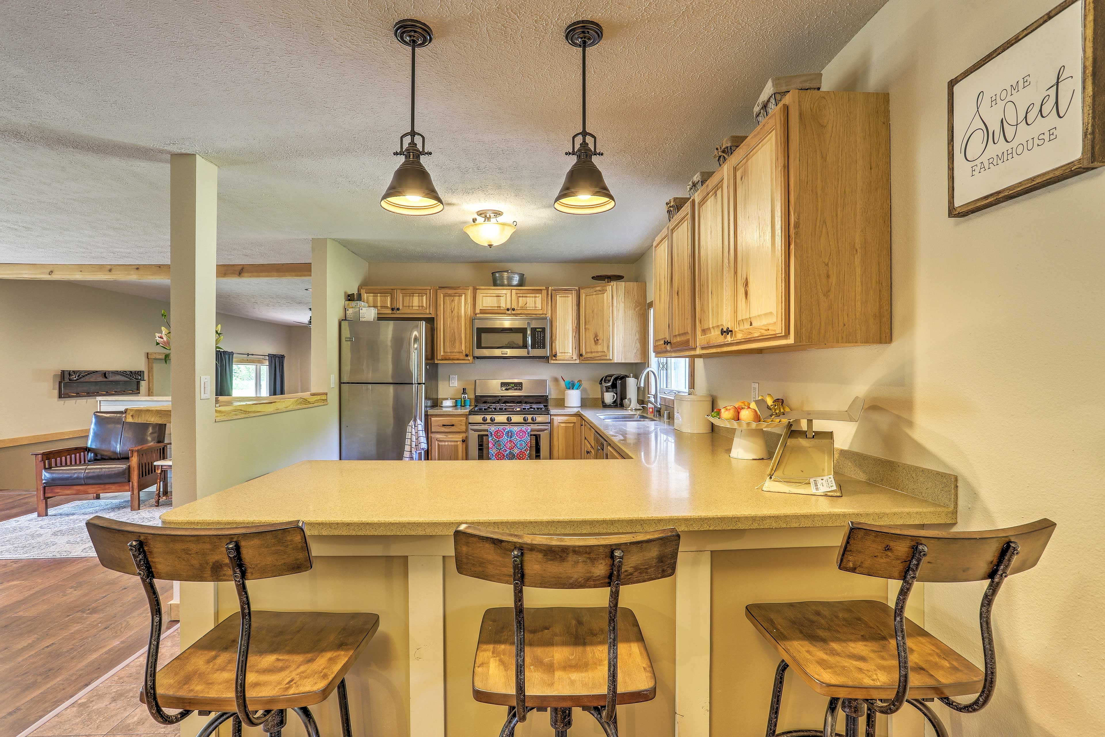 The kitchen is fully equipped, boasting stainless steel appliances!