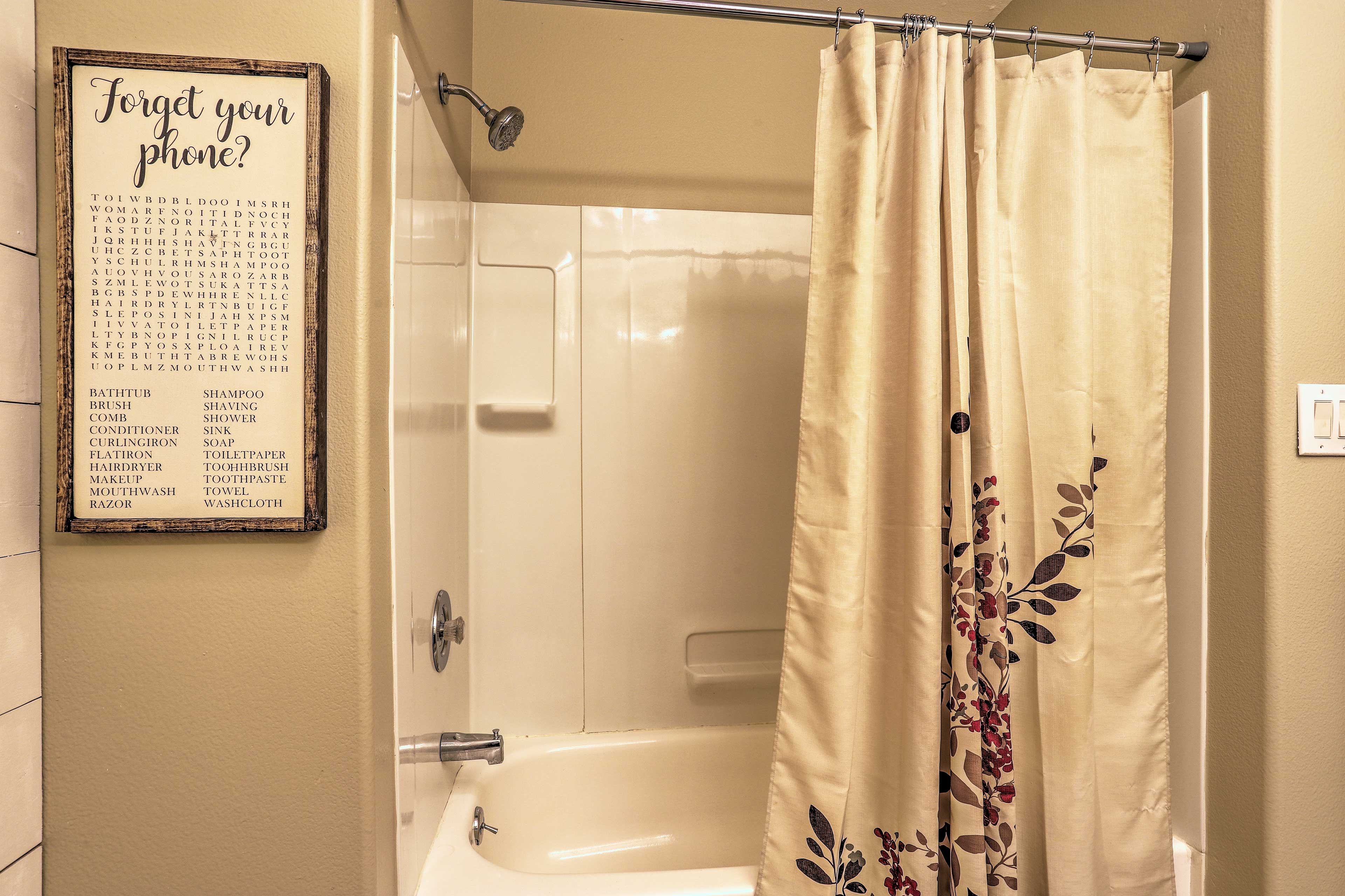 Wash off in the shower/tub combo.