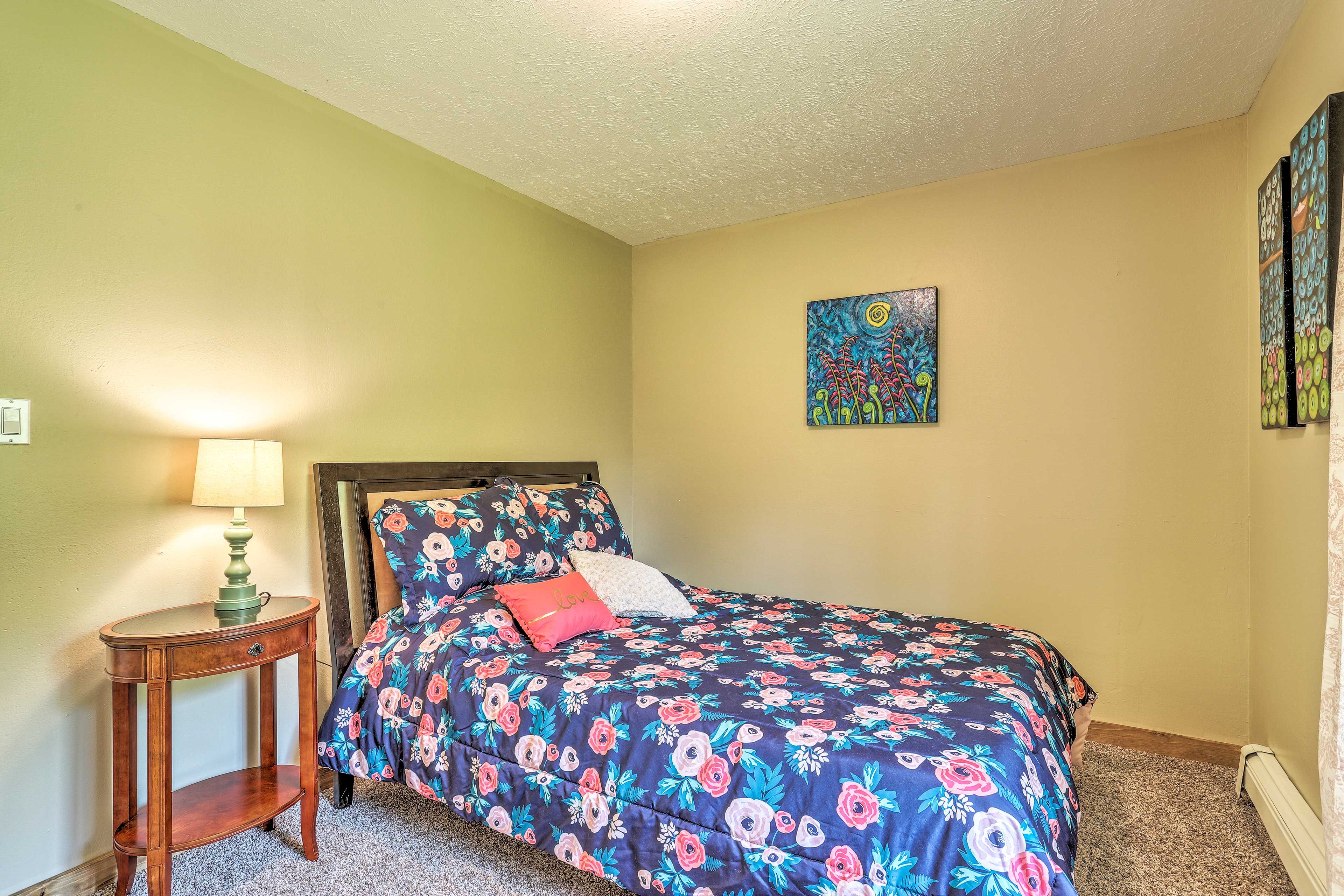 Baseboard heating keeps this bedroom cozy.