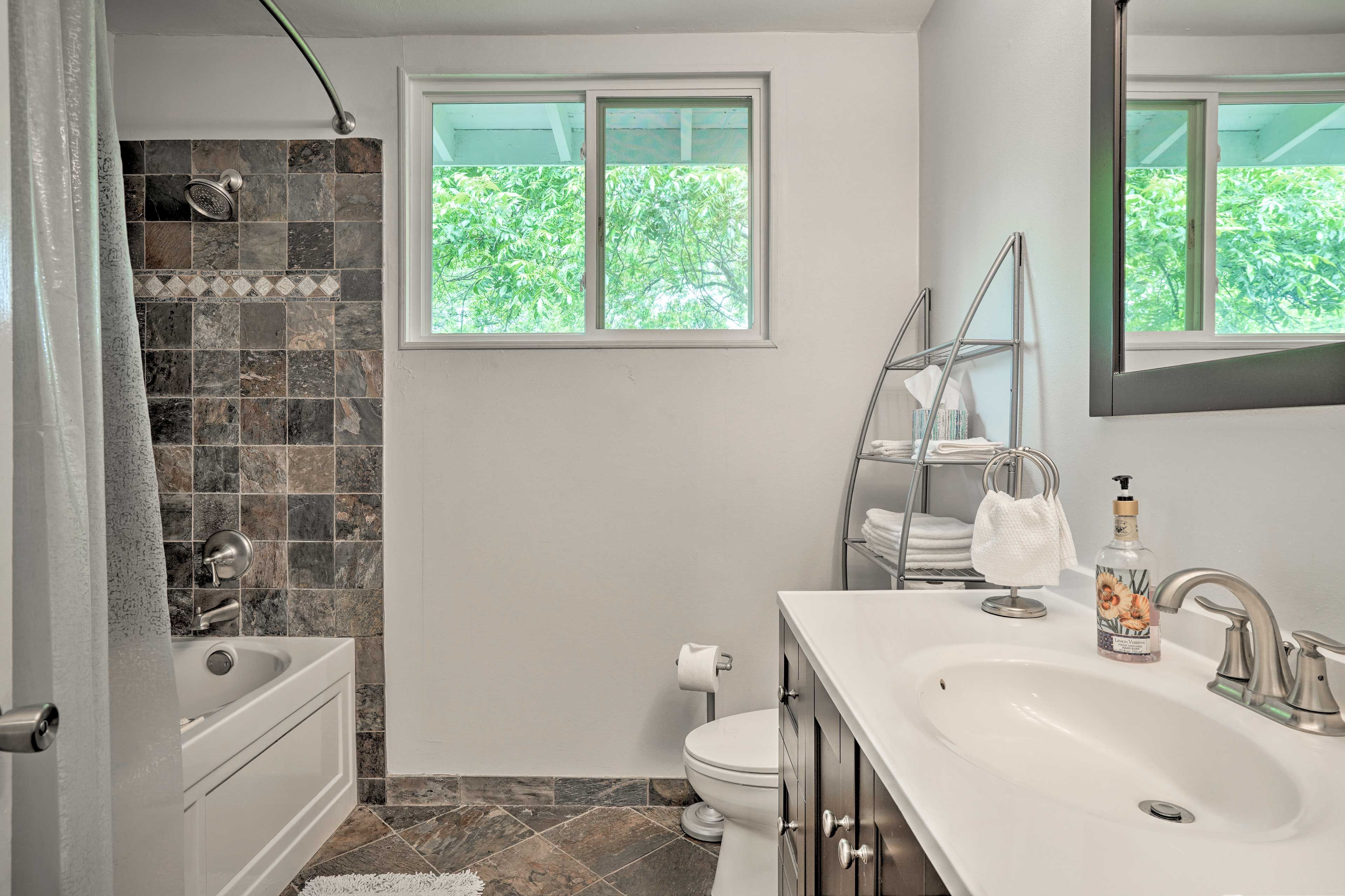 The full bathroom is plenty spacious enough for your group.