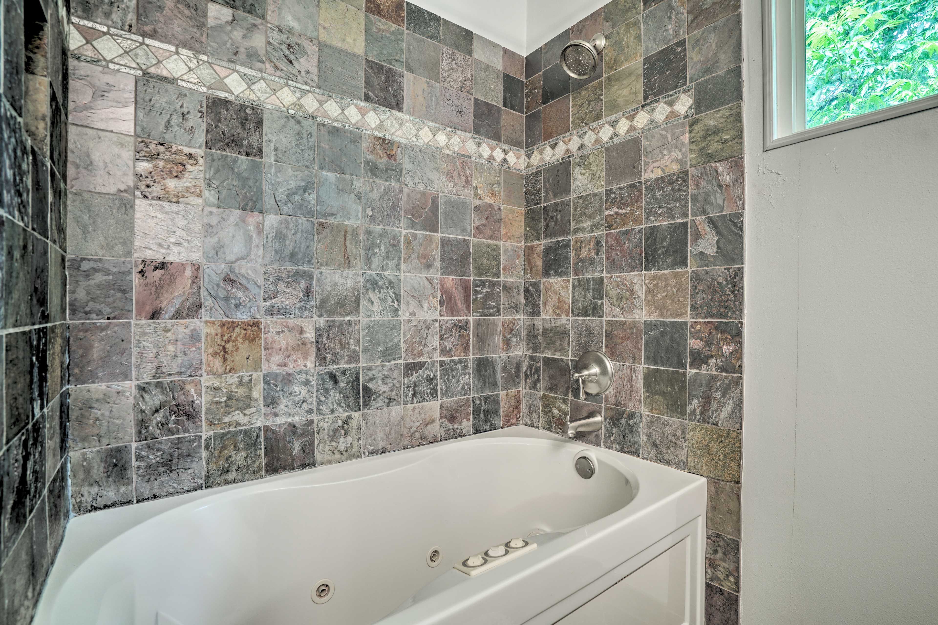 Treat yourself to a soak in the jetted tub.