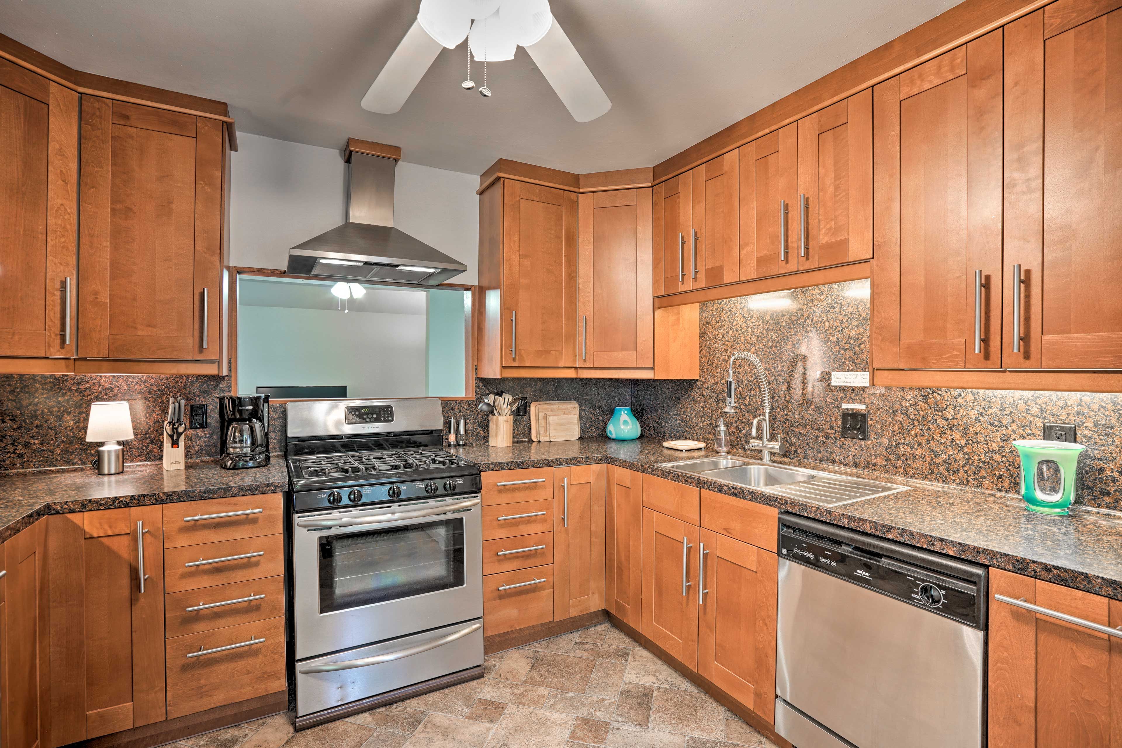 Stainless steel appliances elevate the kitchen.