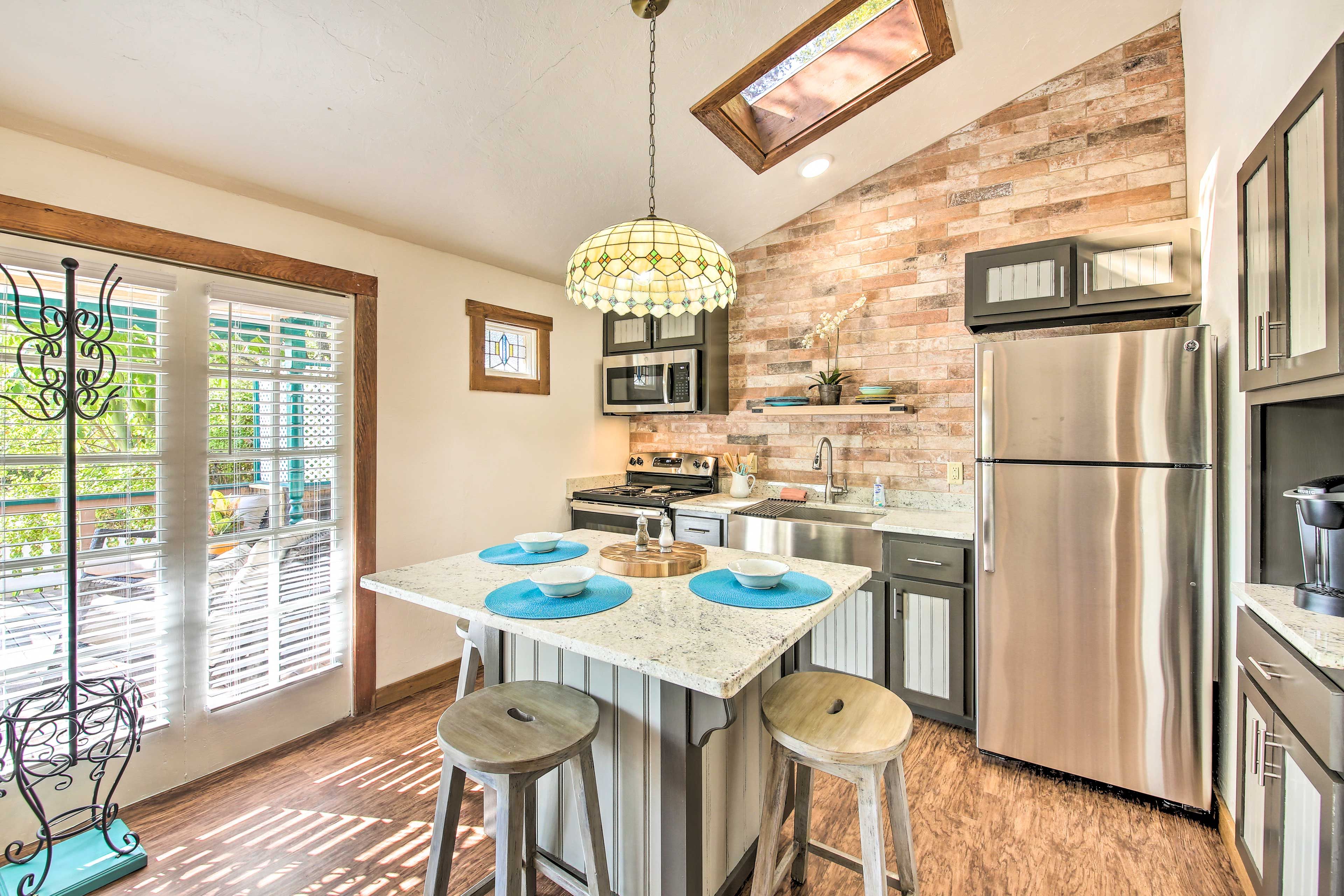 The updated kitchen features a Keurig coffee maker for convenient mornings.