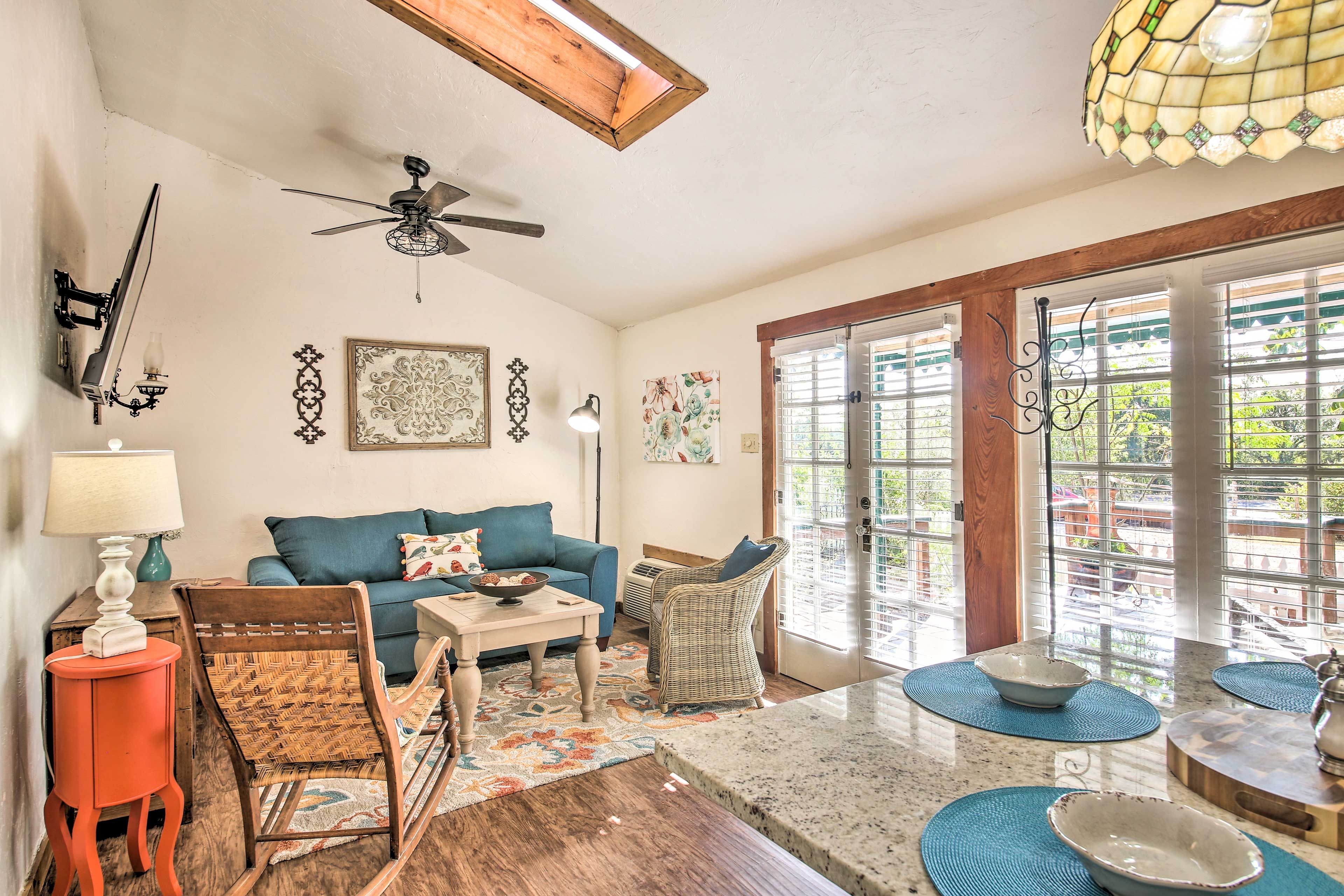 The charming cottage features hardwood floors and skylights.