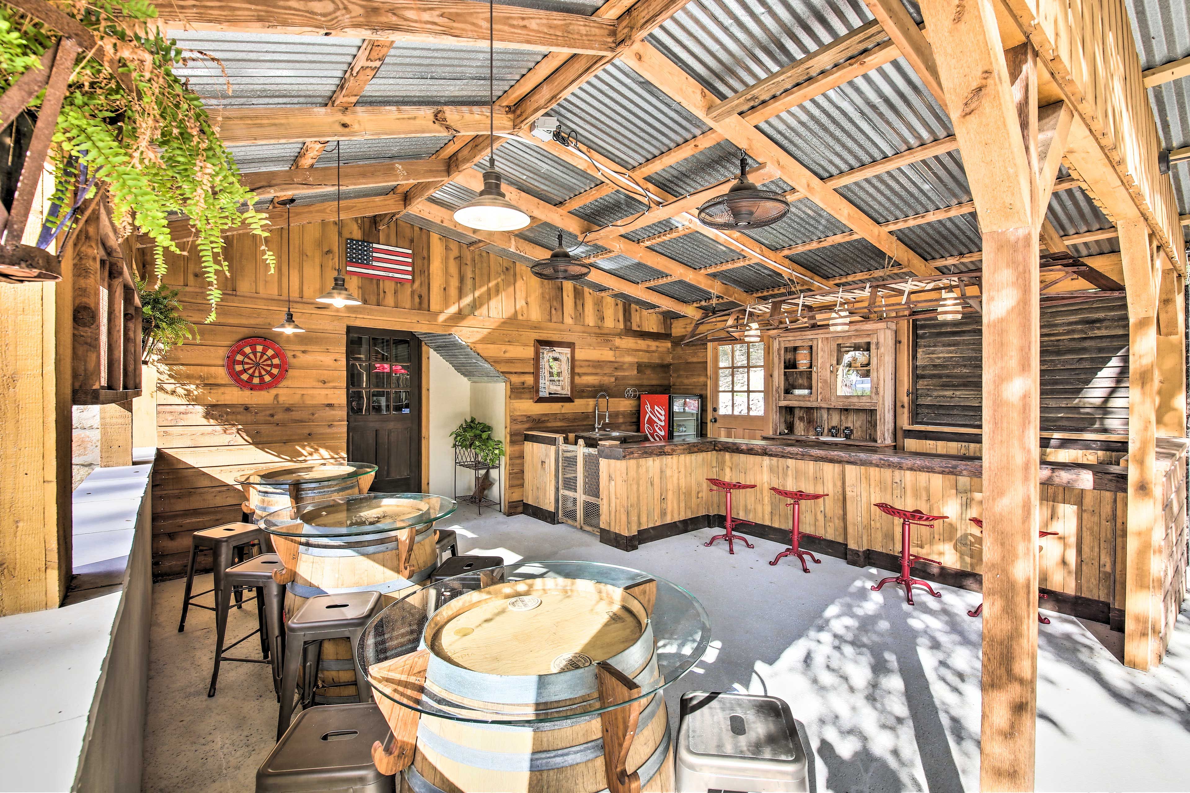 Hang out in the rustic outdoor bar area.