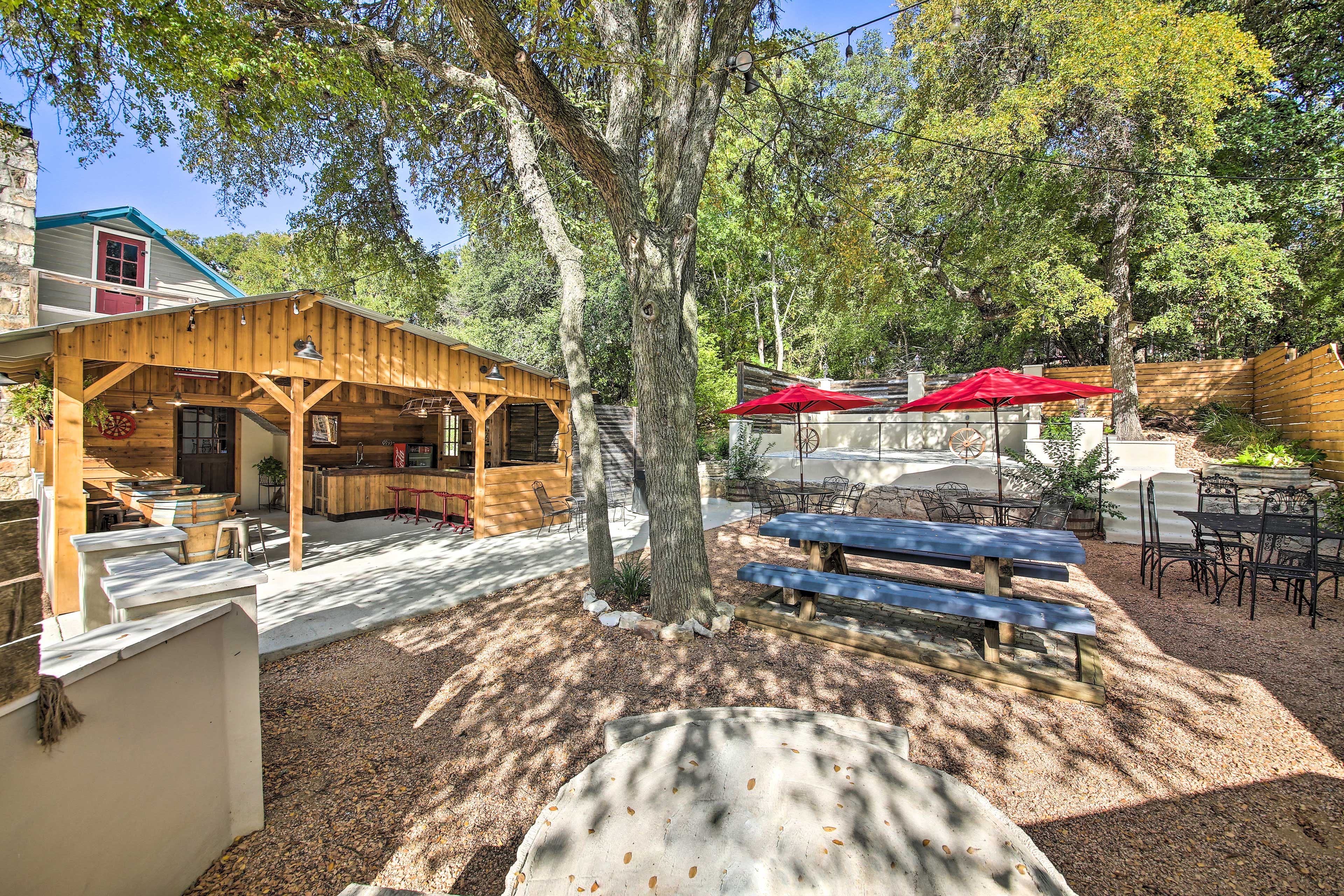 The community features a charming, rustic outdoor living space.