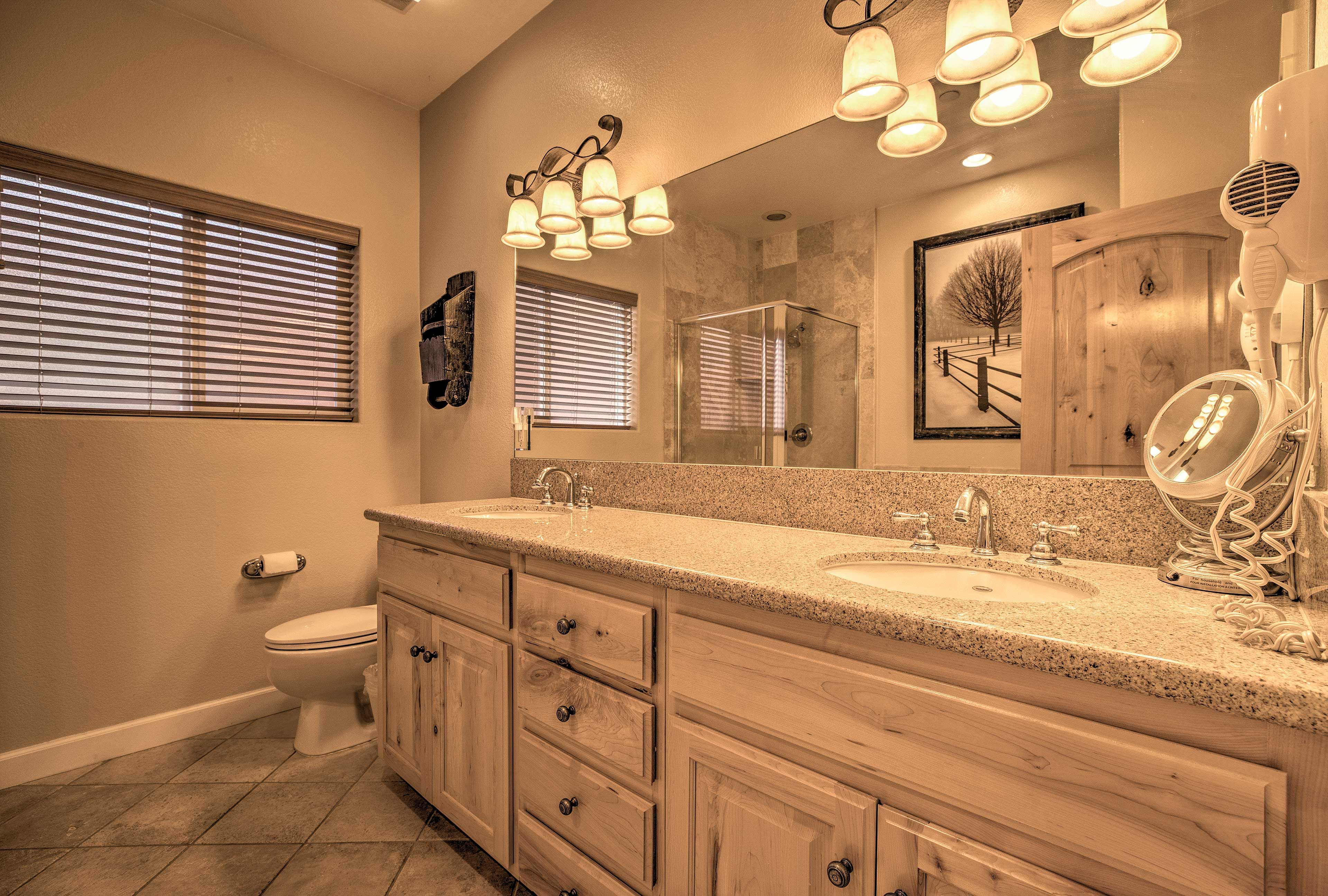 The en-suite bathroom has a spacious dual-sink vanity.