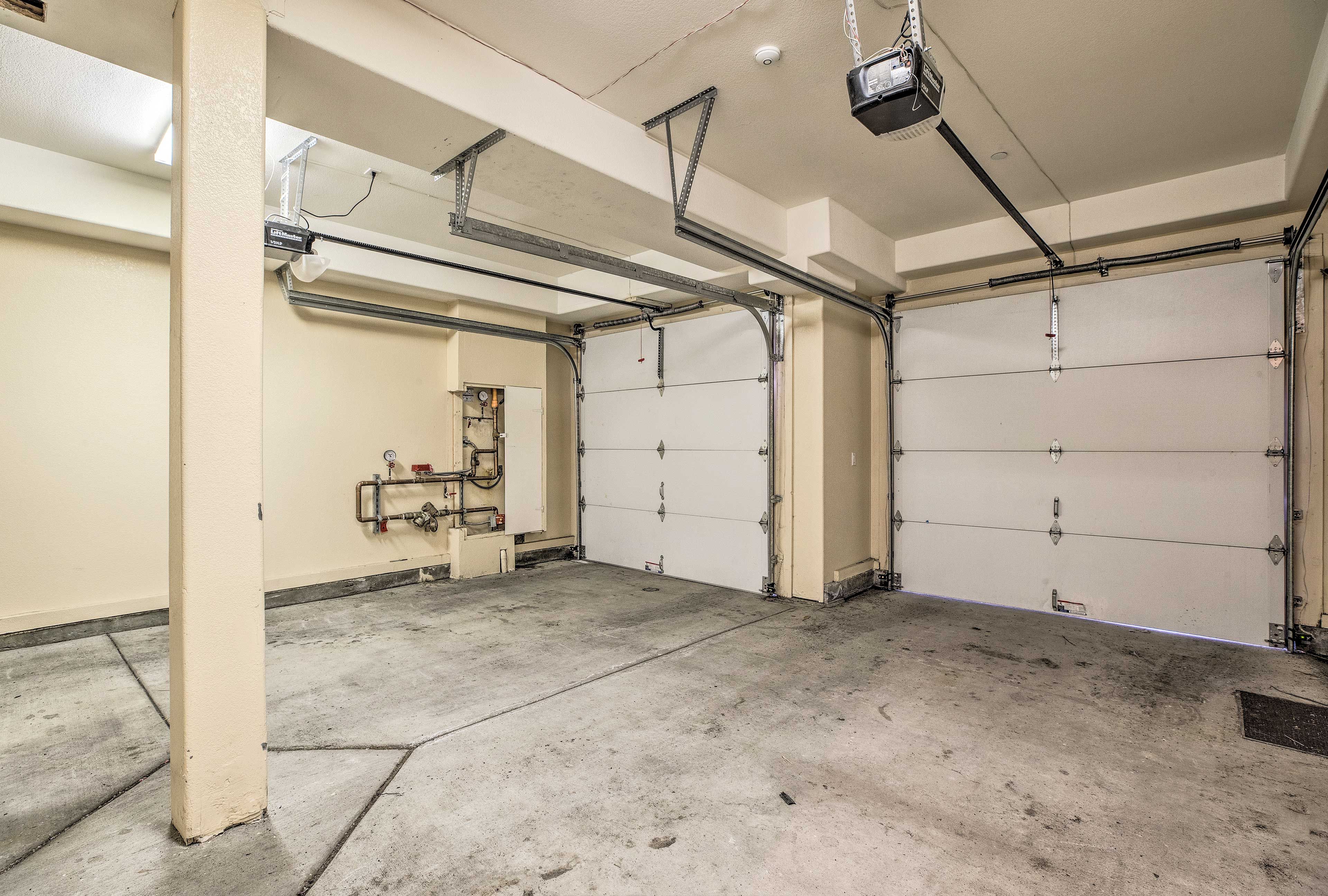 Two small vehicles can be parked in the garage.