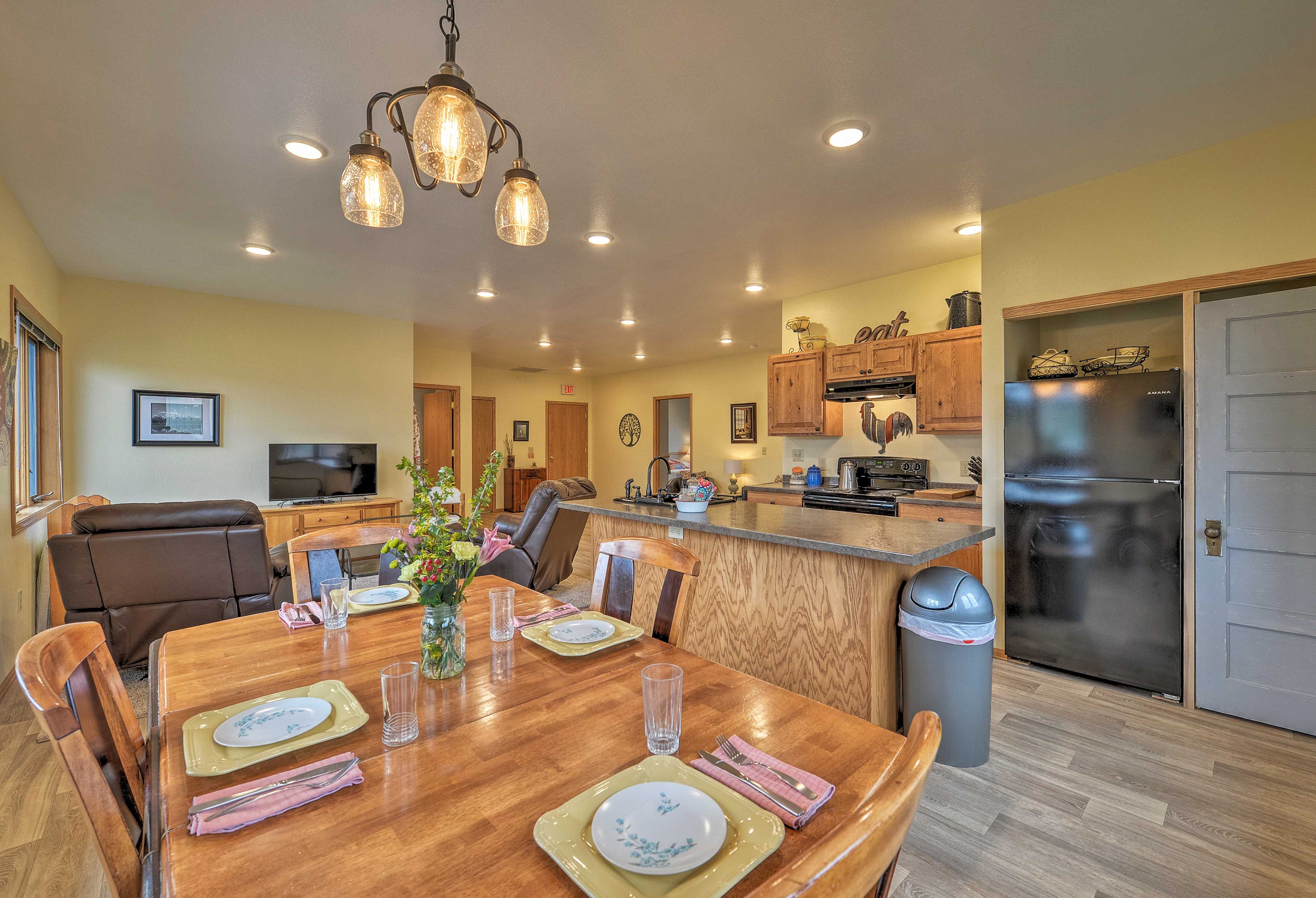 Enjoy a meal with the whole crew at the 4-seat dining table.