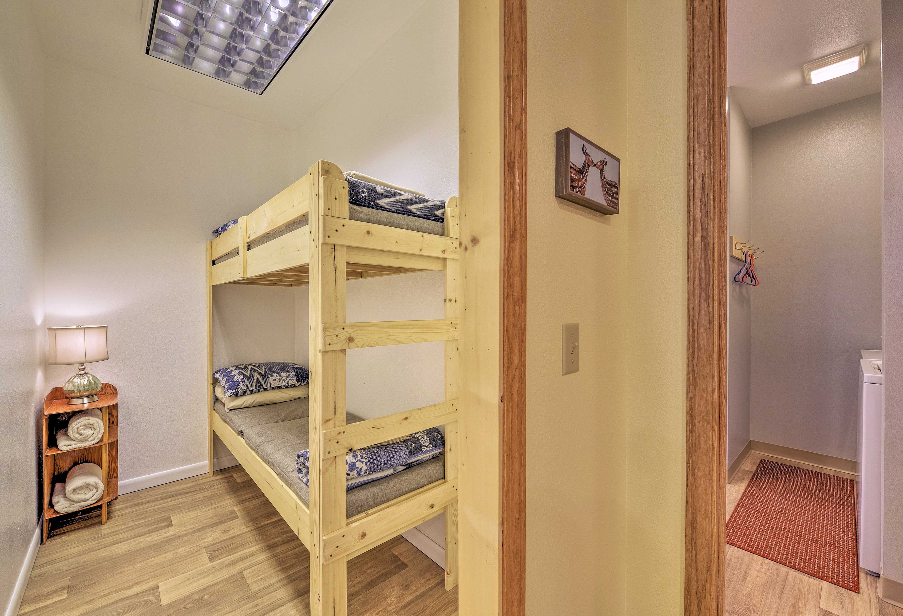 Kids will love making this private twin bunk room their home!