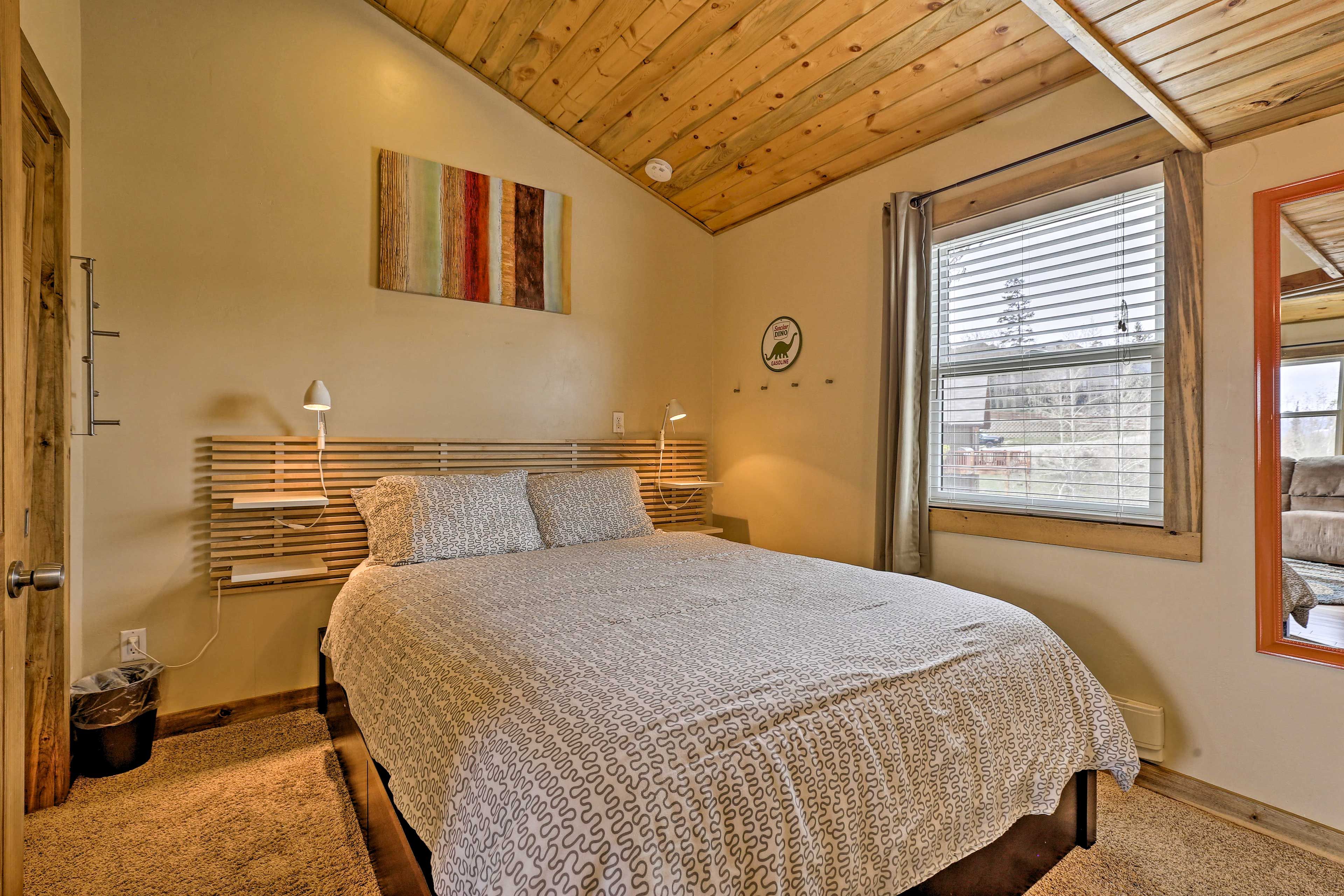 The first bedroom includes a queen bed.