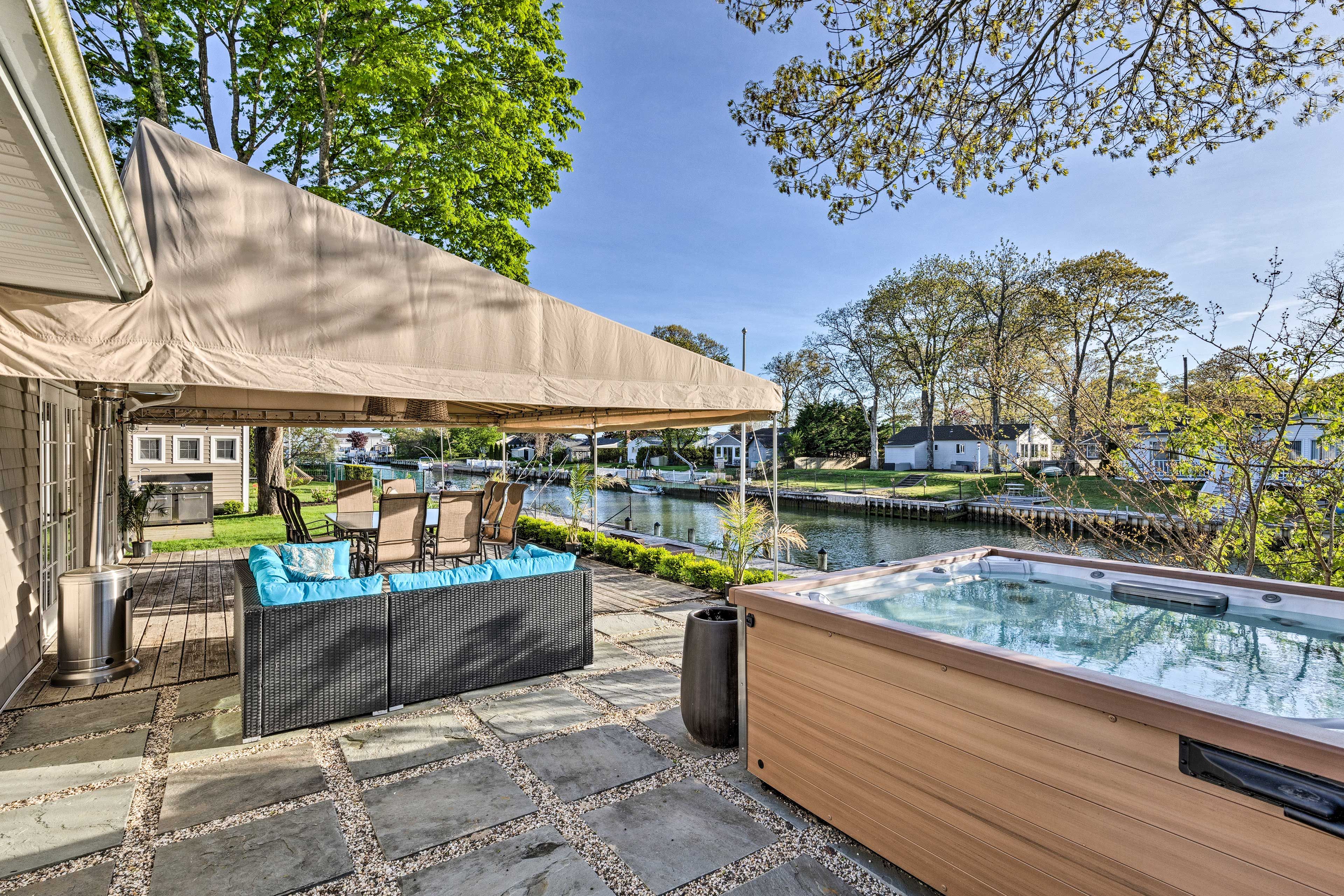 East Quogue Vacation Rental | 3BR | 3BA | 2,220 Sq Ft | Stairs to Access