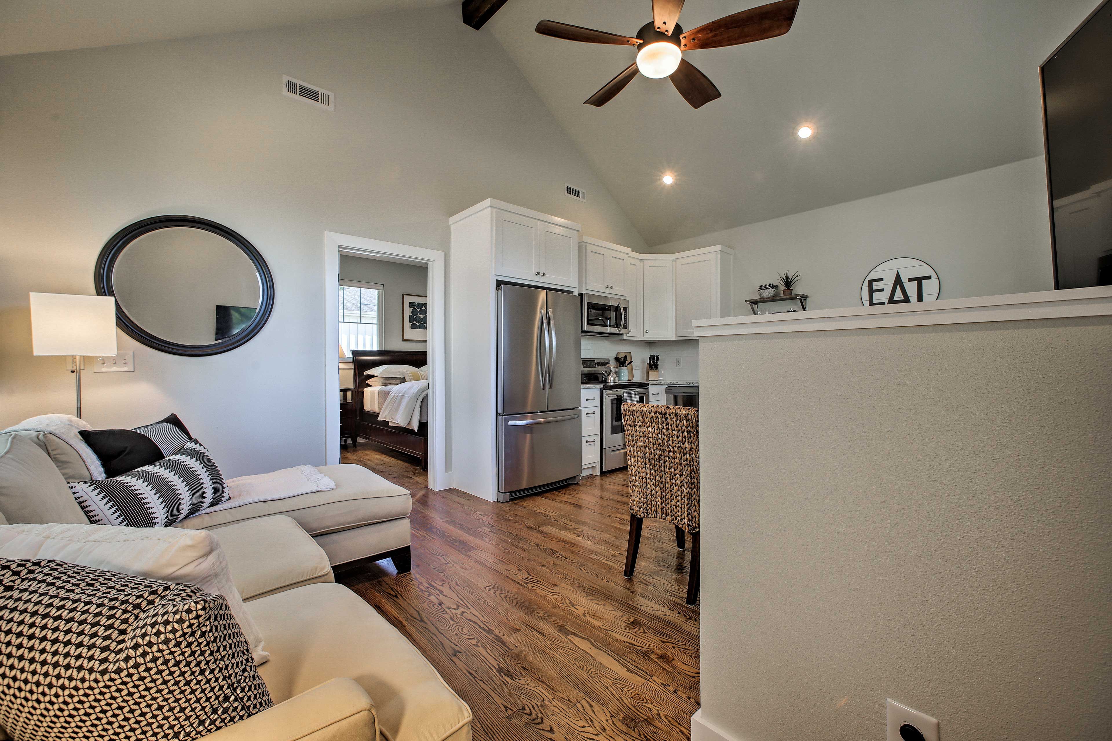 The fully equipped kitchen is tucked just around the corner.