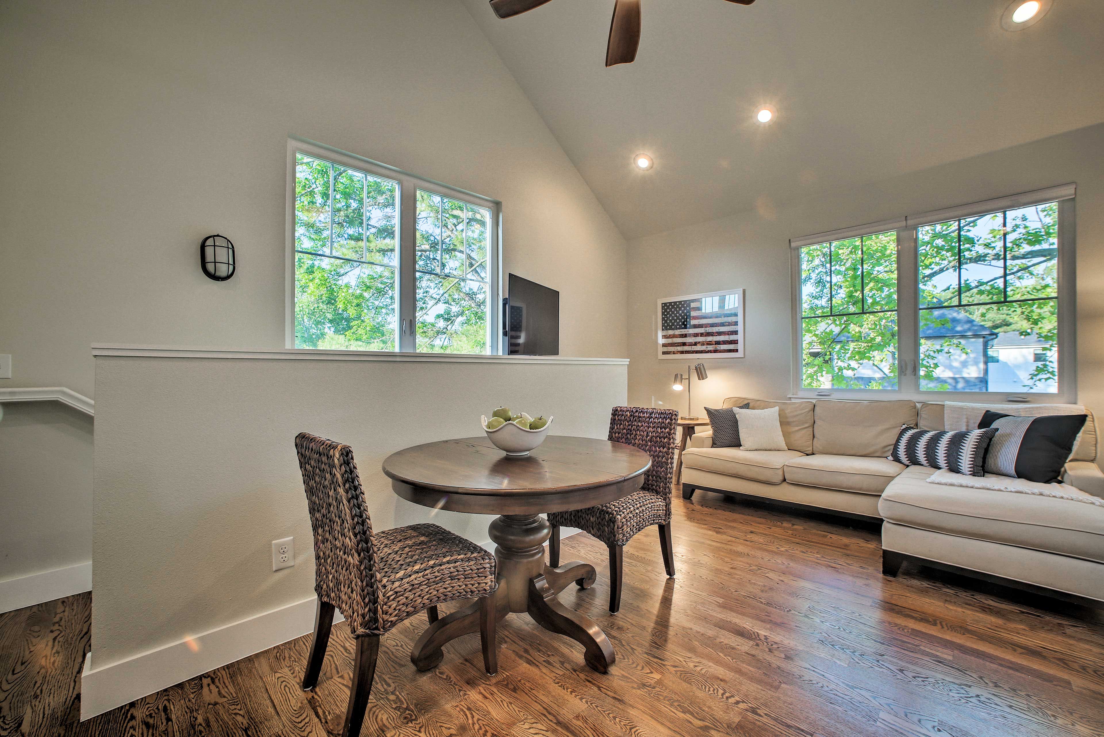 The 2-person wooden table offers an elegant space to dine.