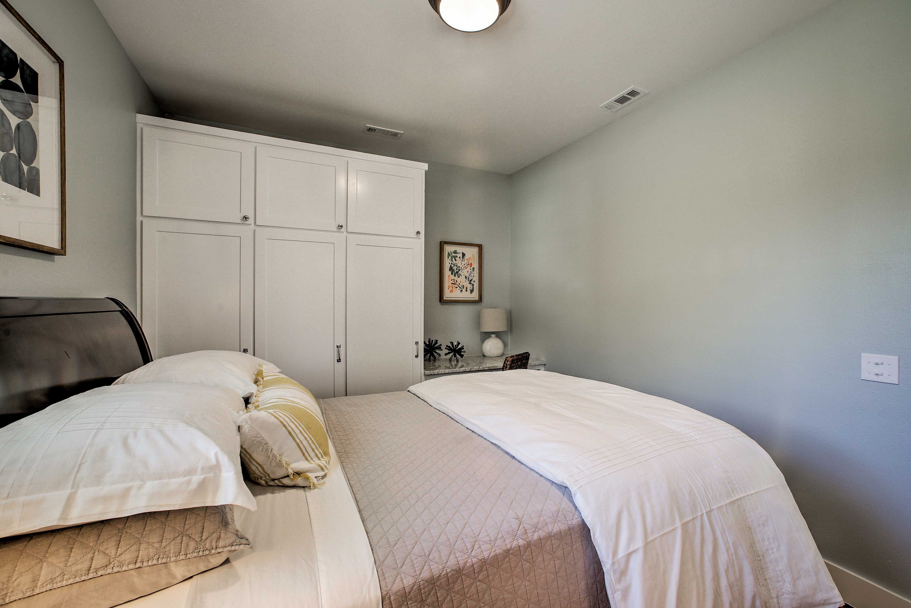 There's a built-in desk and a spacious wardrobe.