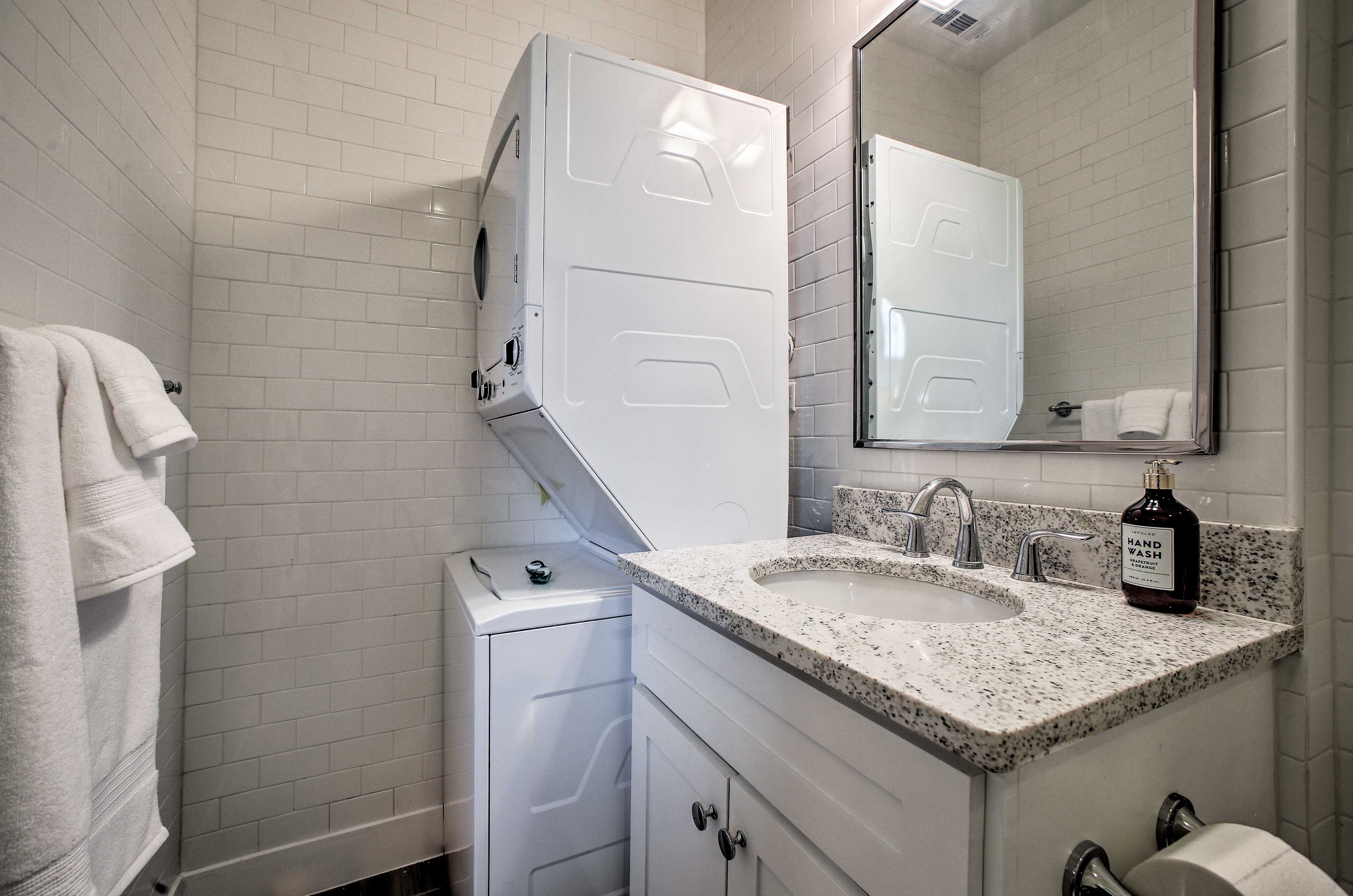 The stacked washer and dryer make it easy to keep your clothing fresh!