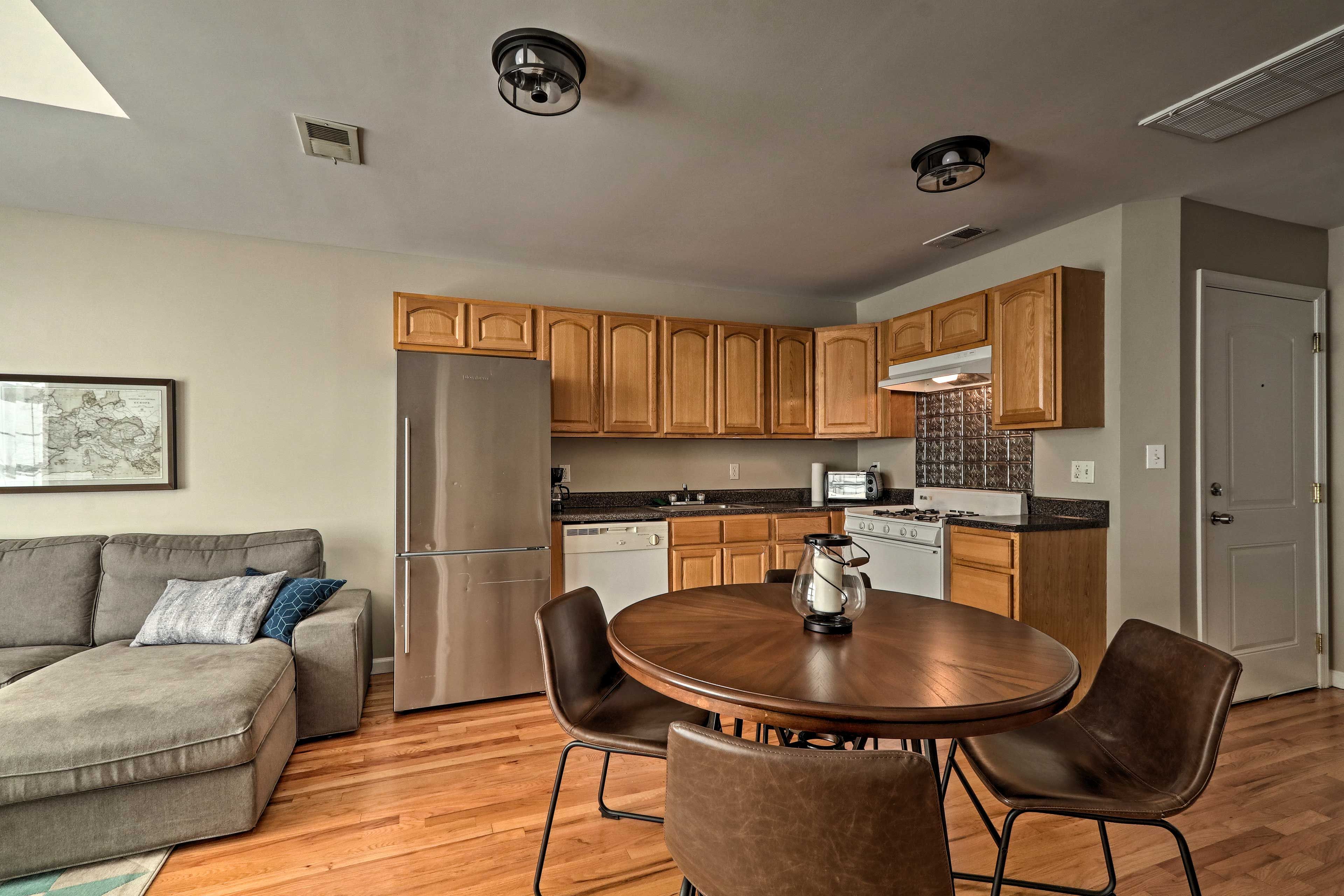 Savor each bite of your family meals together at the 4-person dining table.