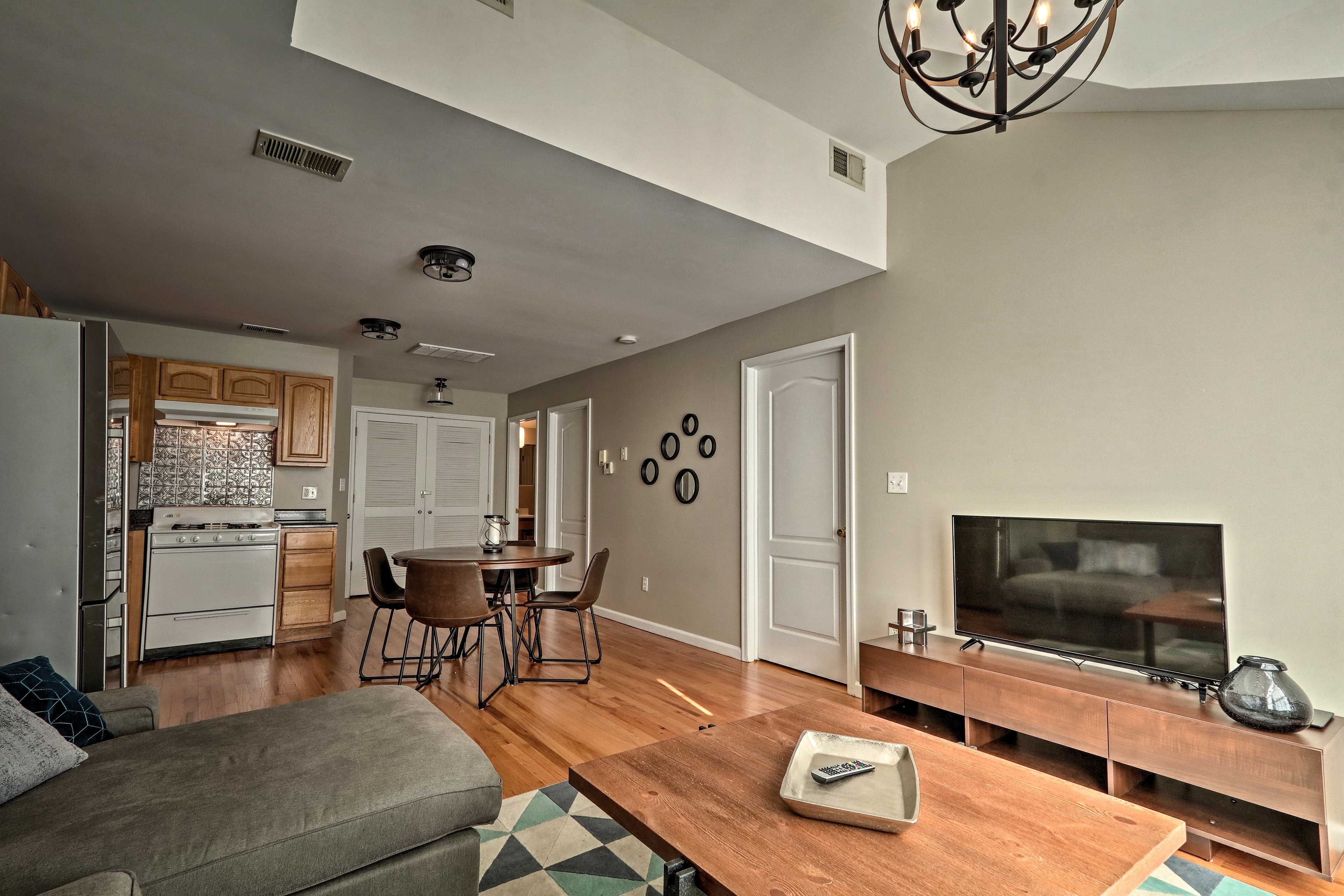 Lounge on the sectional, set in front of the flat-screen Smart TV.