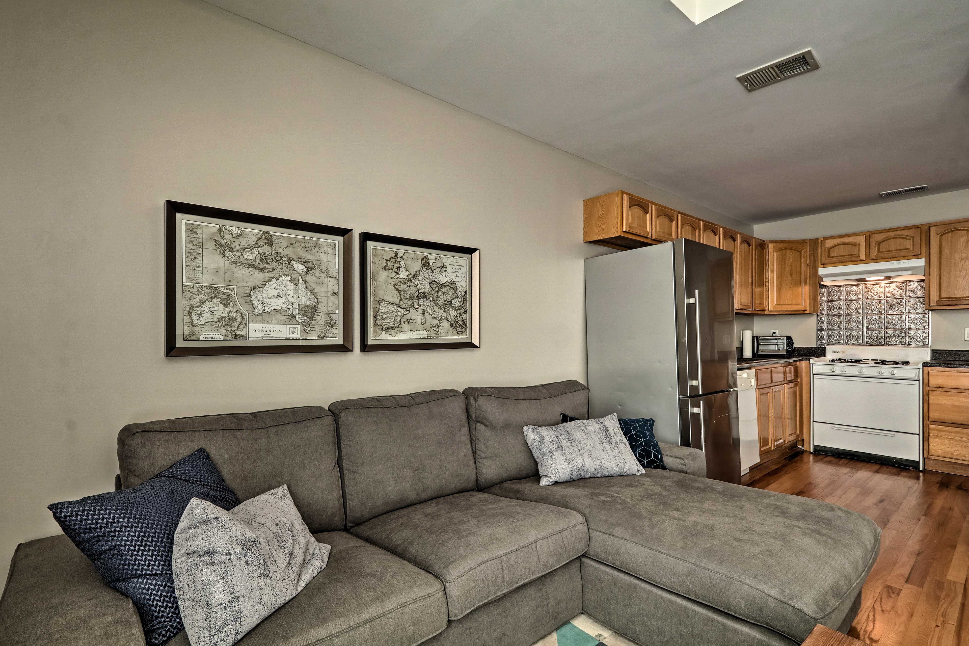 Hardwood flooring covers the entirety of the apartment.