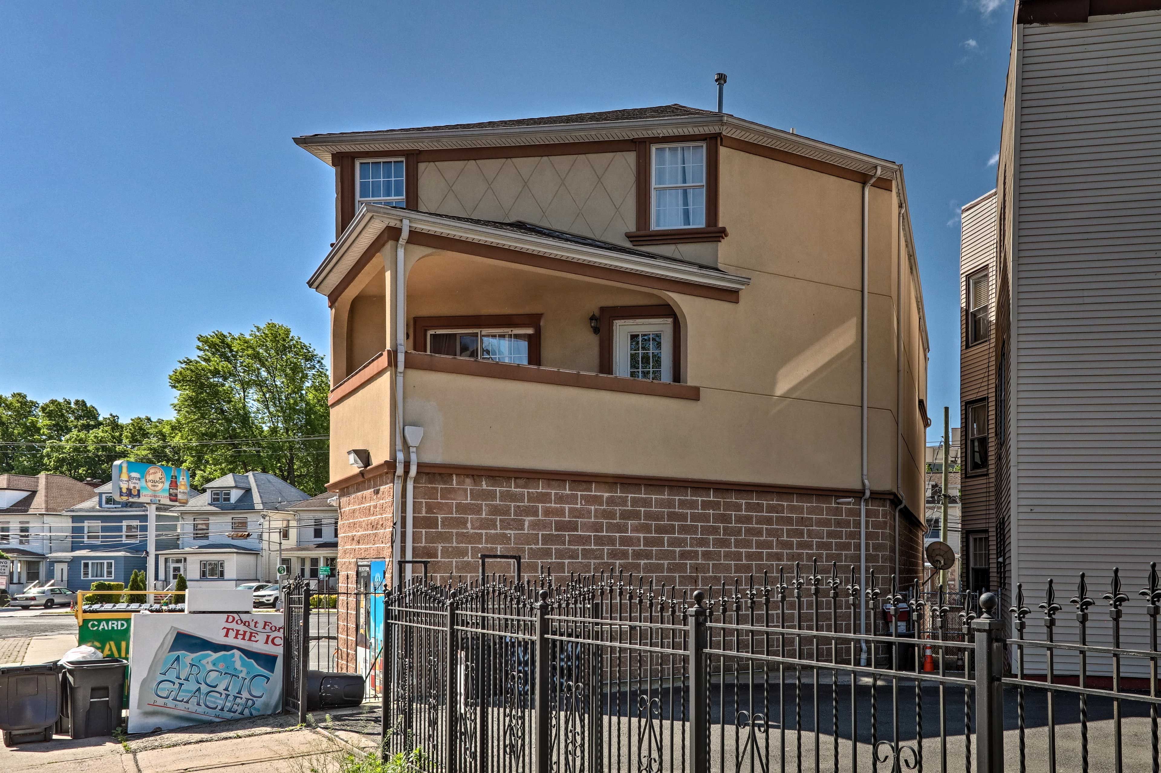 The entrance is accessible up a set of stairs.