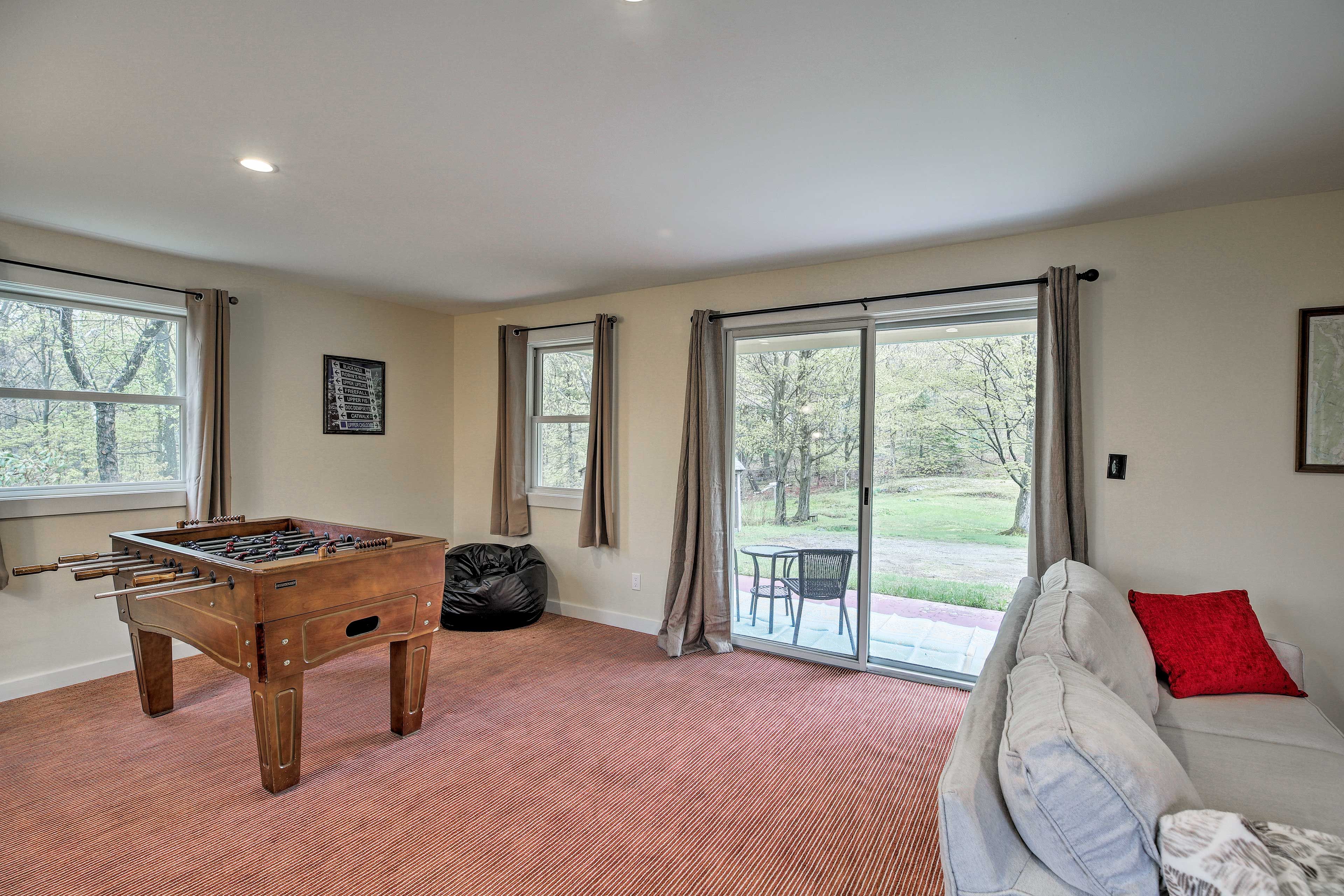 Challenge companions to a foosball match or sink into the bean bag to watch.