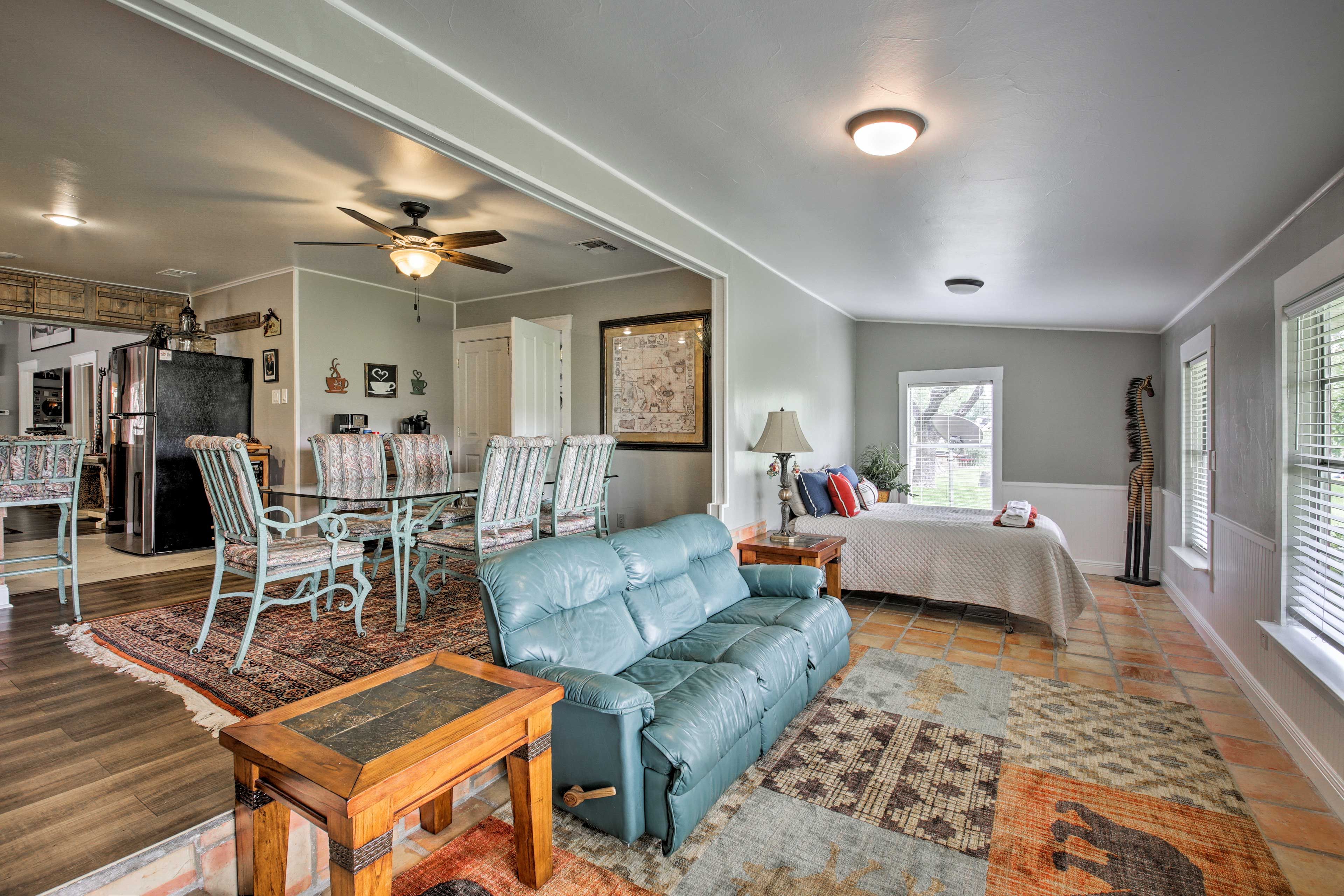 The dining room flows into the sunroom.