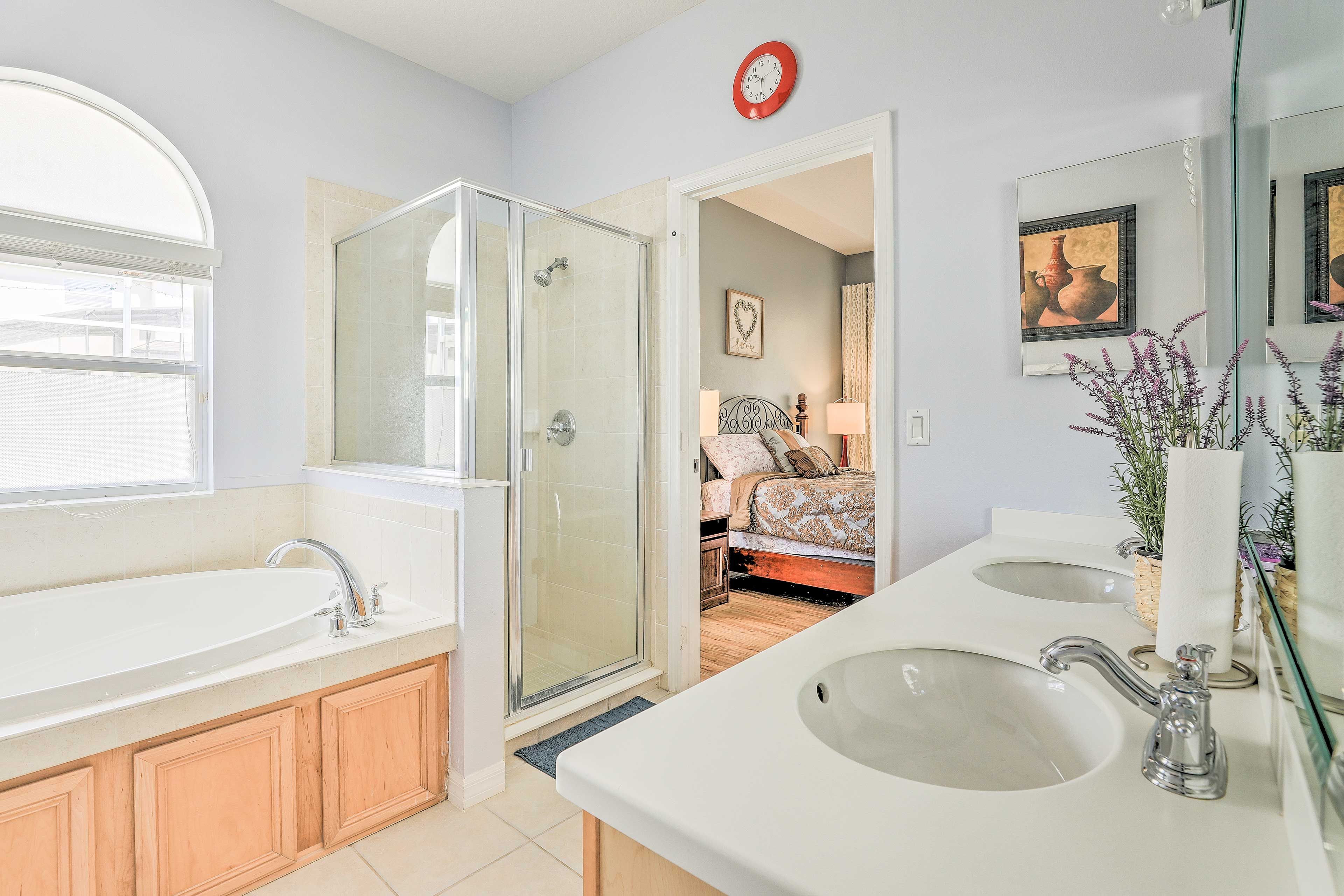 Rinse off in the walk-in shower or take a relaxing soak in the large tub.