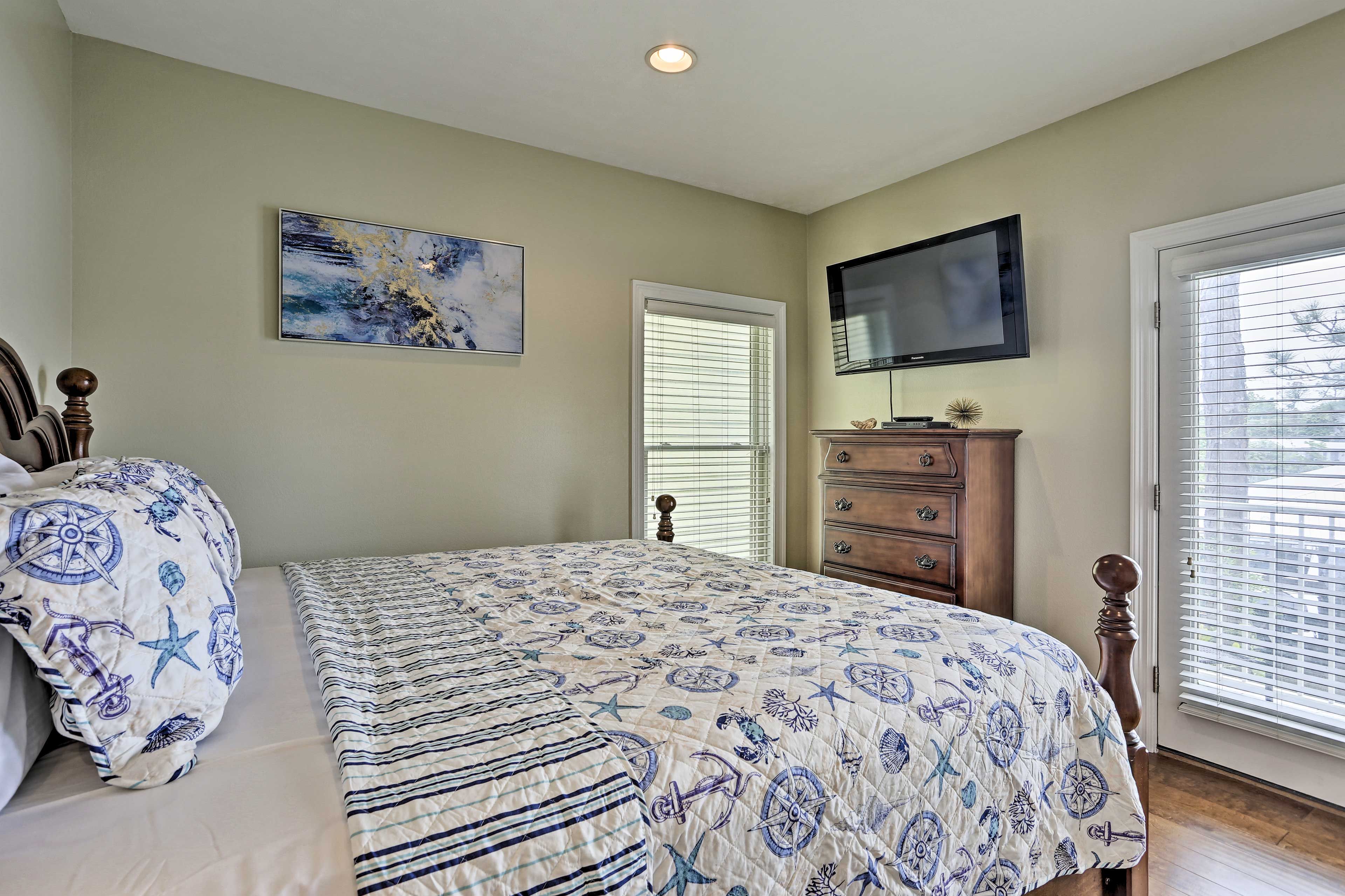 Enjoy private balcony access in this bedroom.