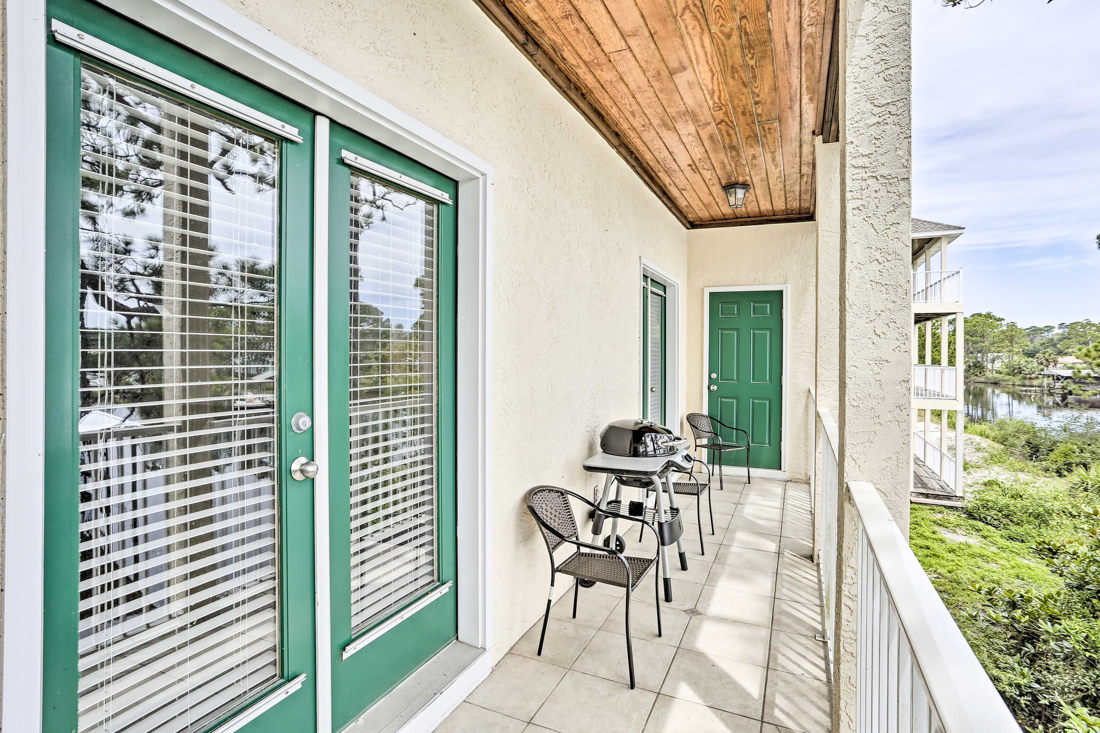 Step outside to gaze out at the dock.