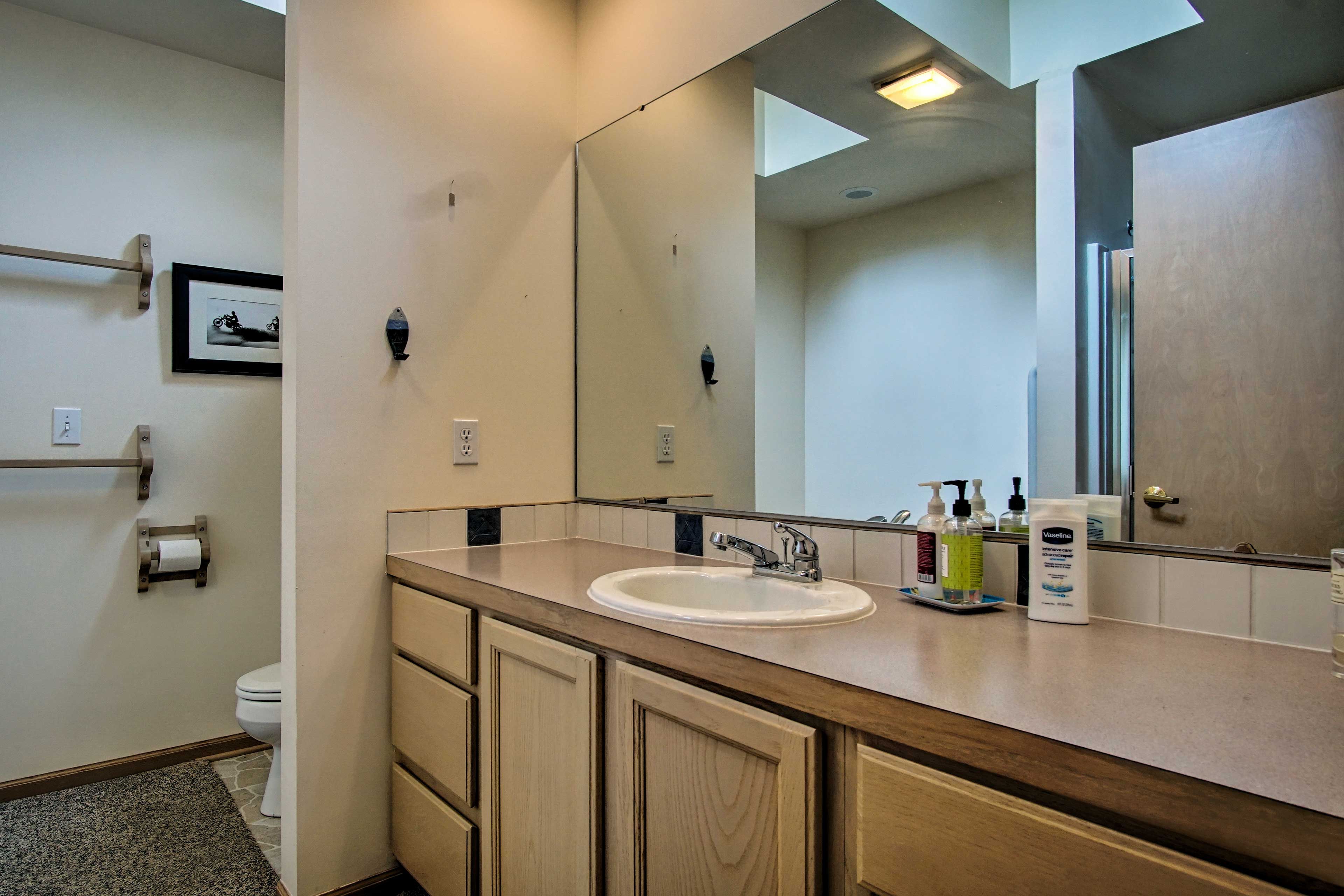 Get ready with ease in the en-suite bathroom.