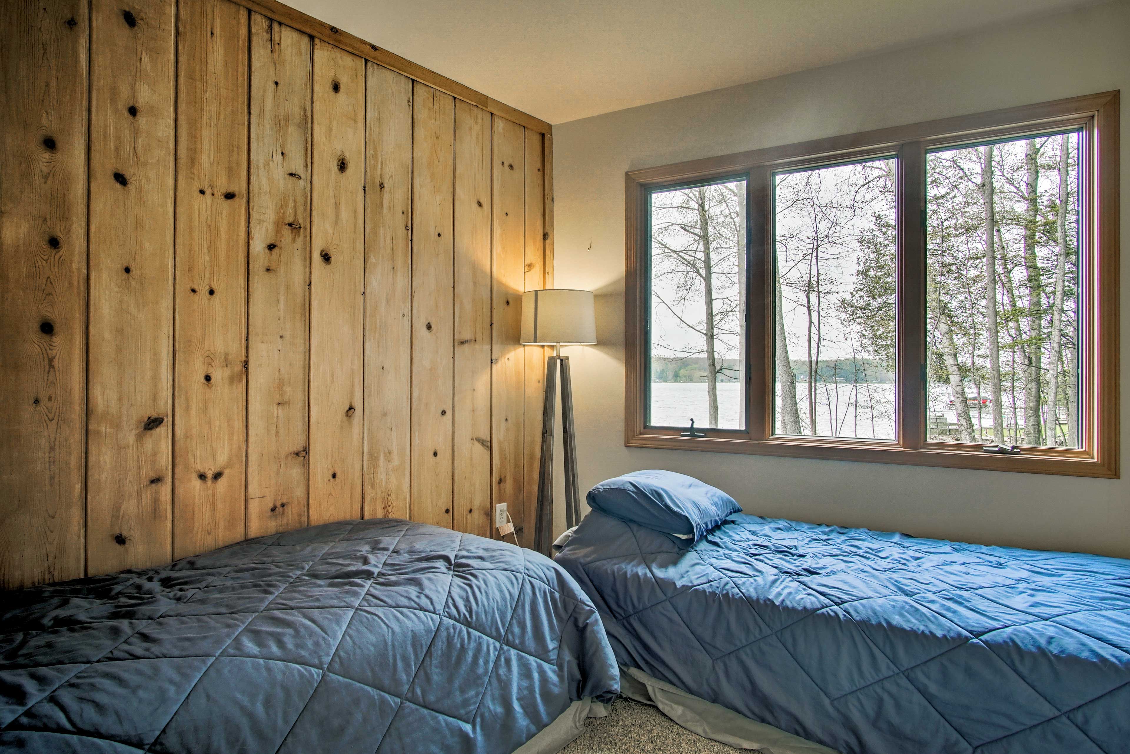 Two more travelers can drift to sleep in these twin beds.