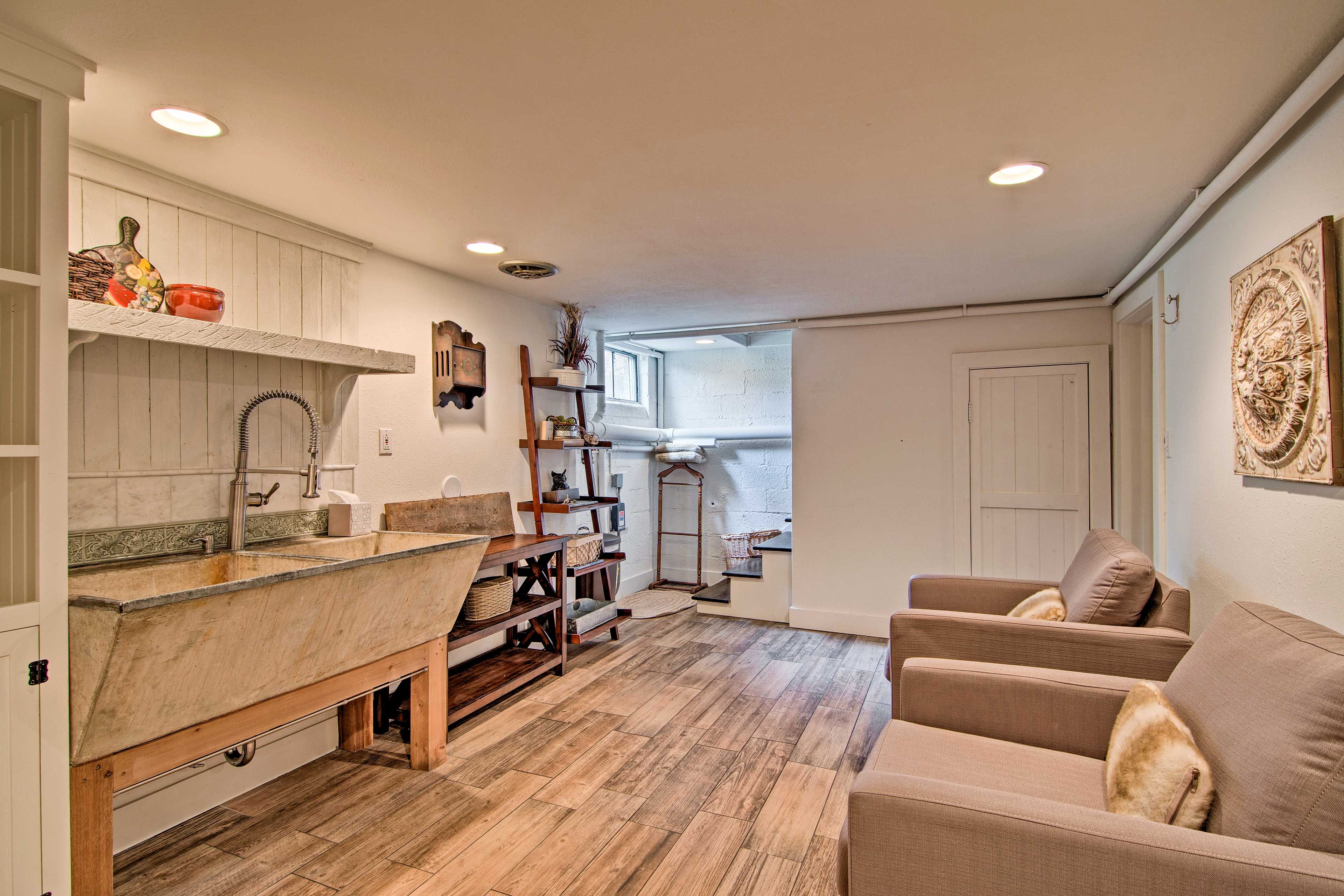 The downstairs includes a small seating area.